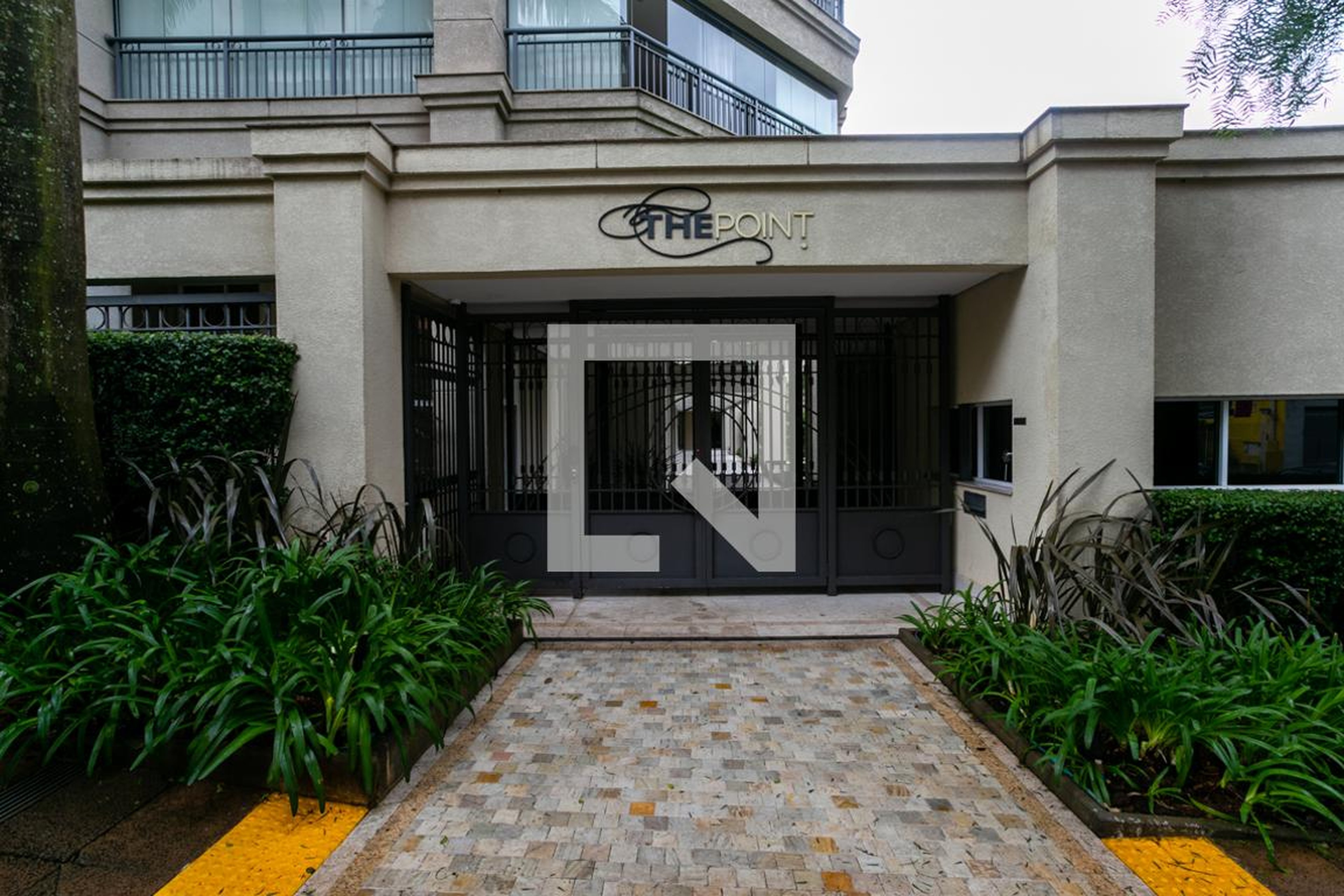 Fachada do Condomínio Condomínio The Point