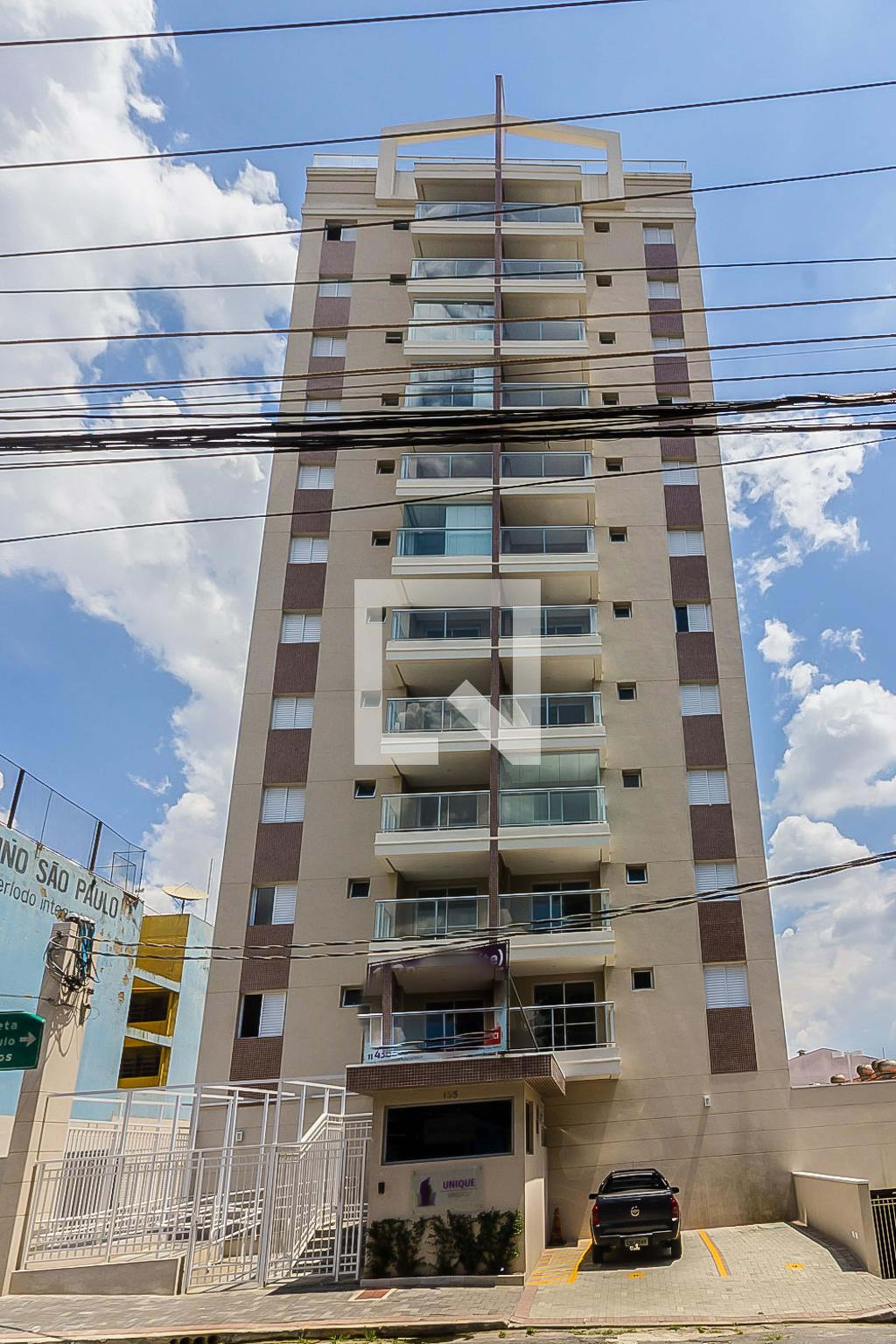 Fachada do Condomínio Condomínio Unique