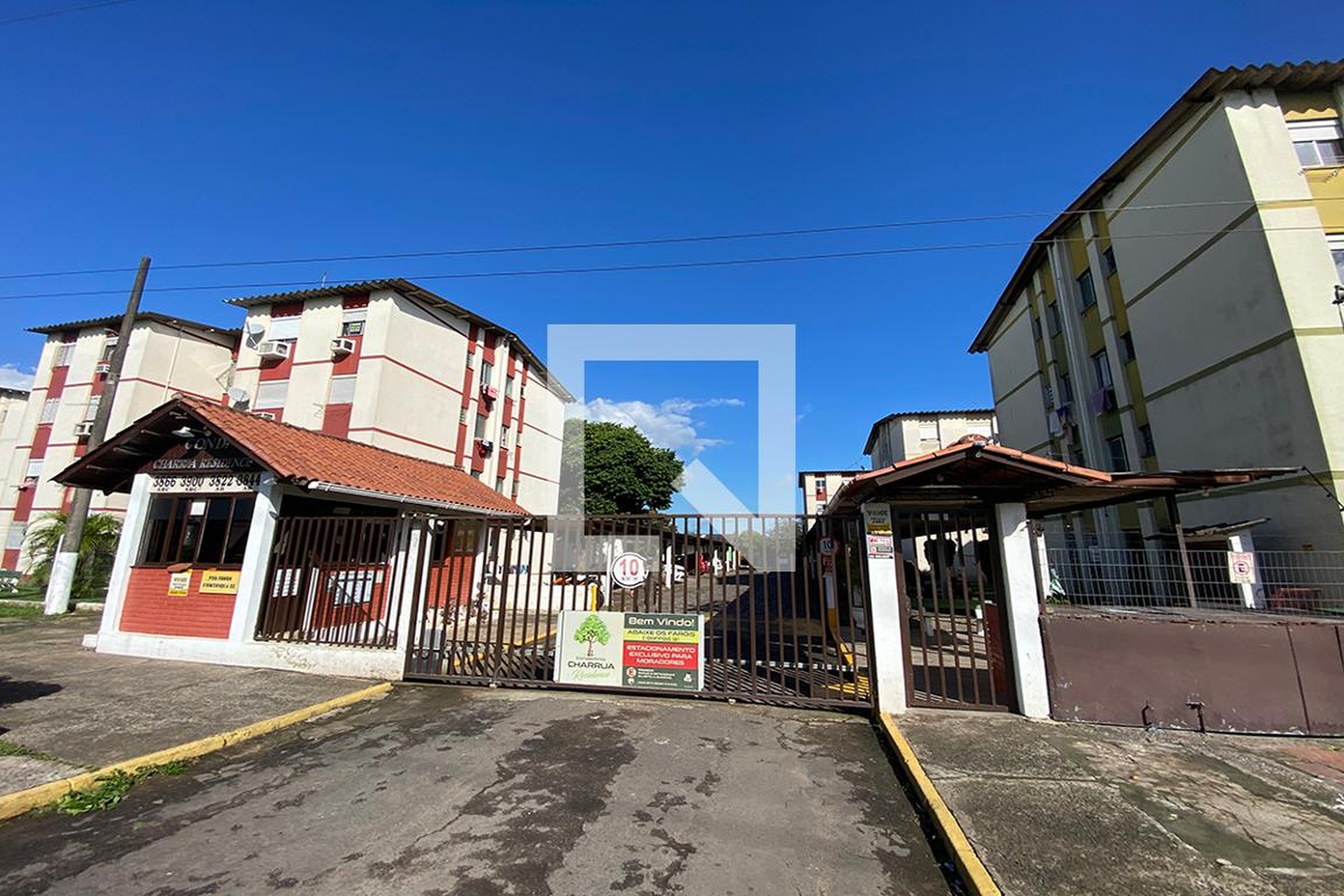 Fachada do Condomínio Condomínio Charrua II