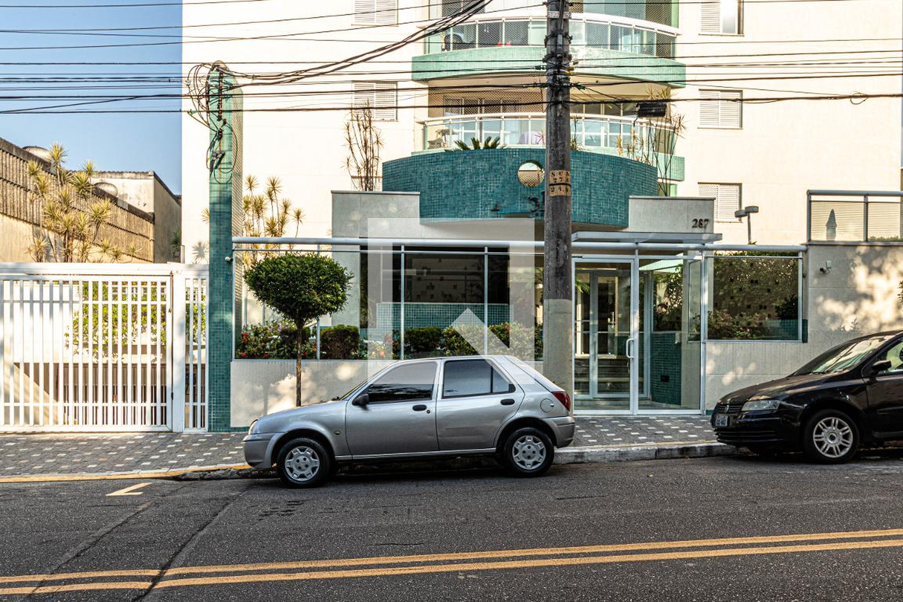 Fachada do Condomínio Condomínio Alpha