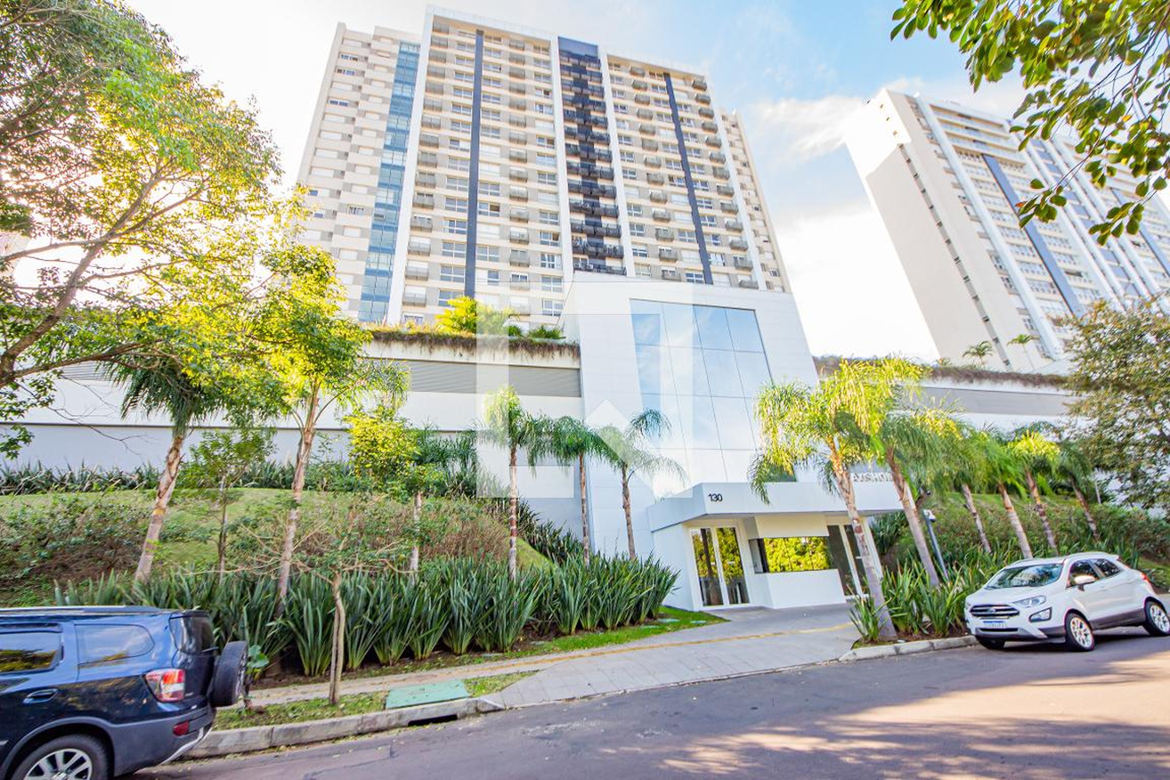 Fachada do Condomínio Condomínio Axis Home