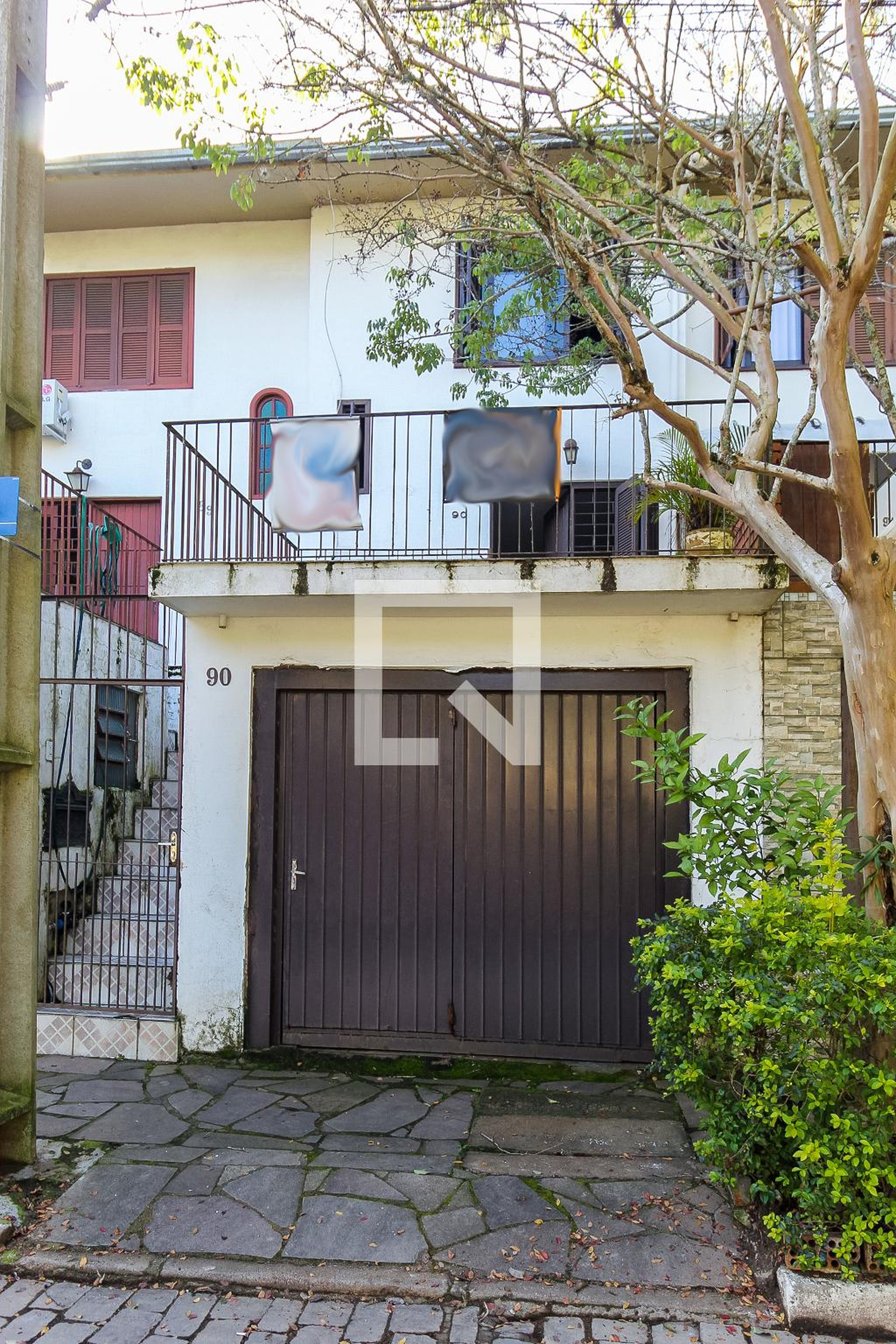 Fachada Condomínio em Rua Almiro Coimbra, 90
