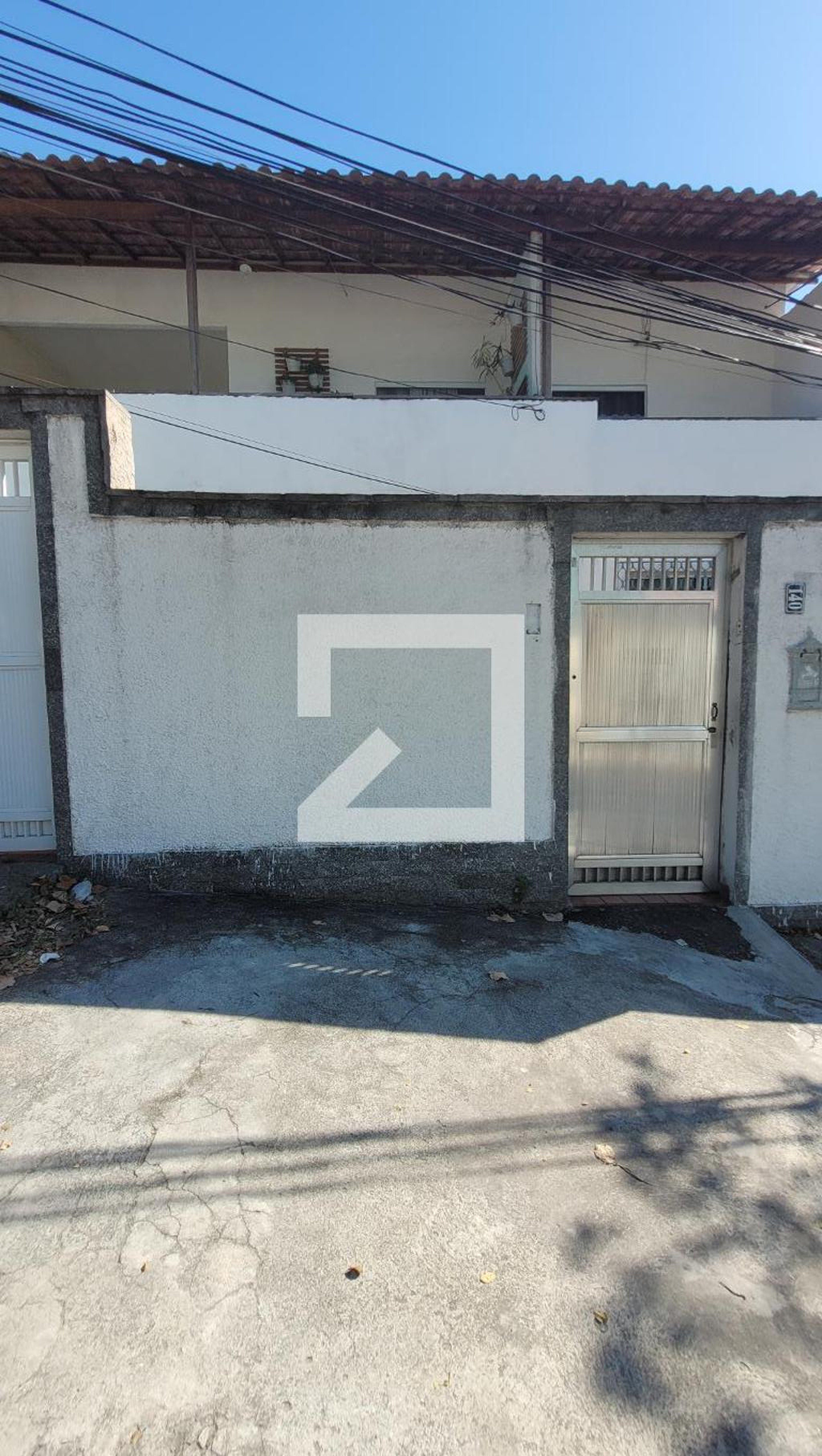 Fachada Condomínio em Rua Onda Branca, 140