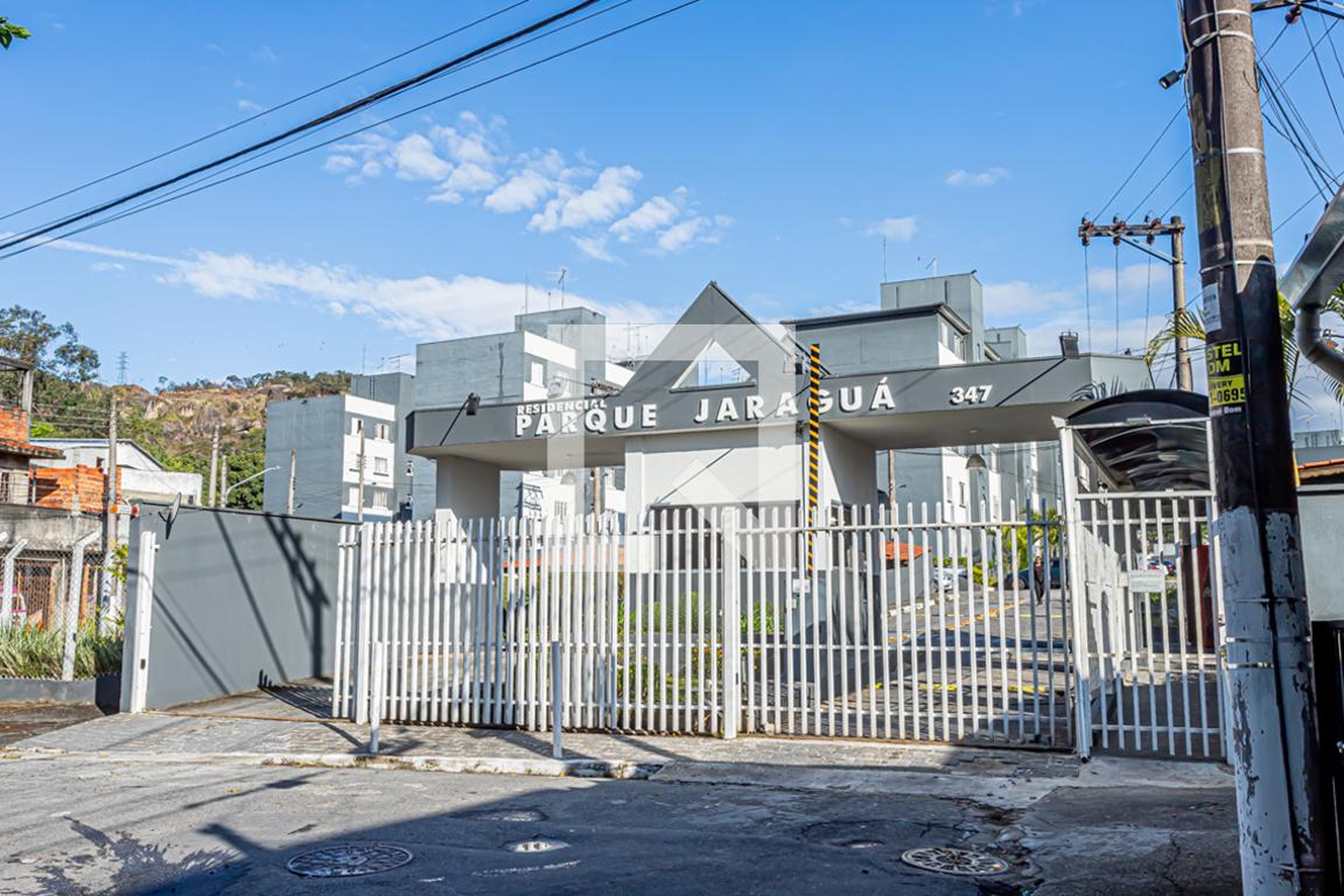 Fachada Condomínio em Rua Ocasos, 36