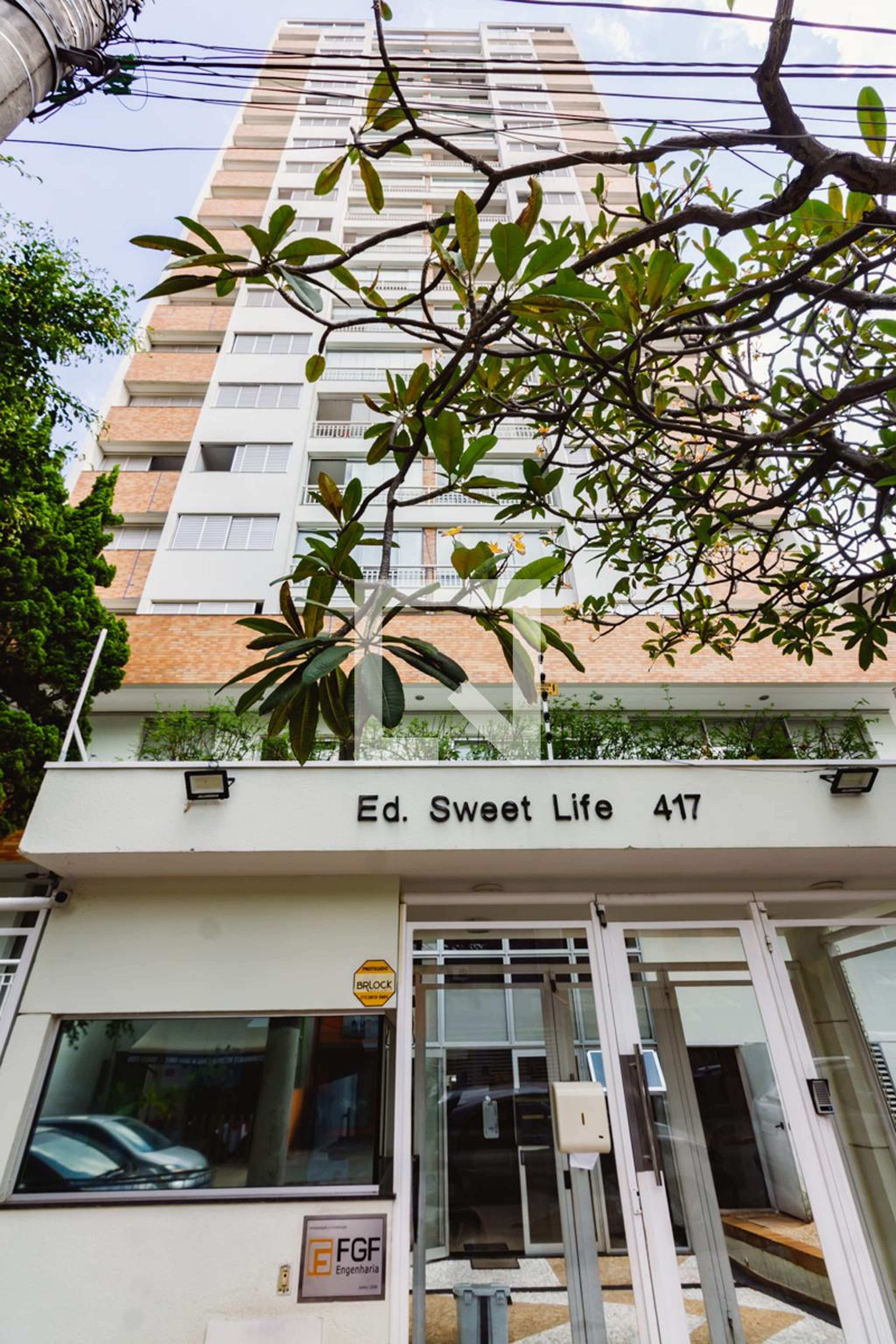 Fachada Condomínio em Rua Coronel Melo de Oliveira, 411