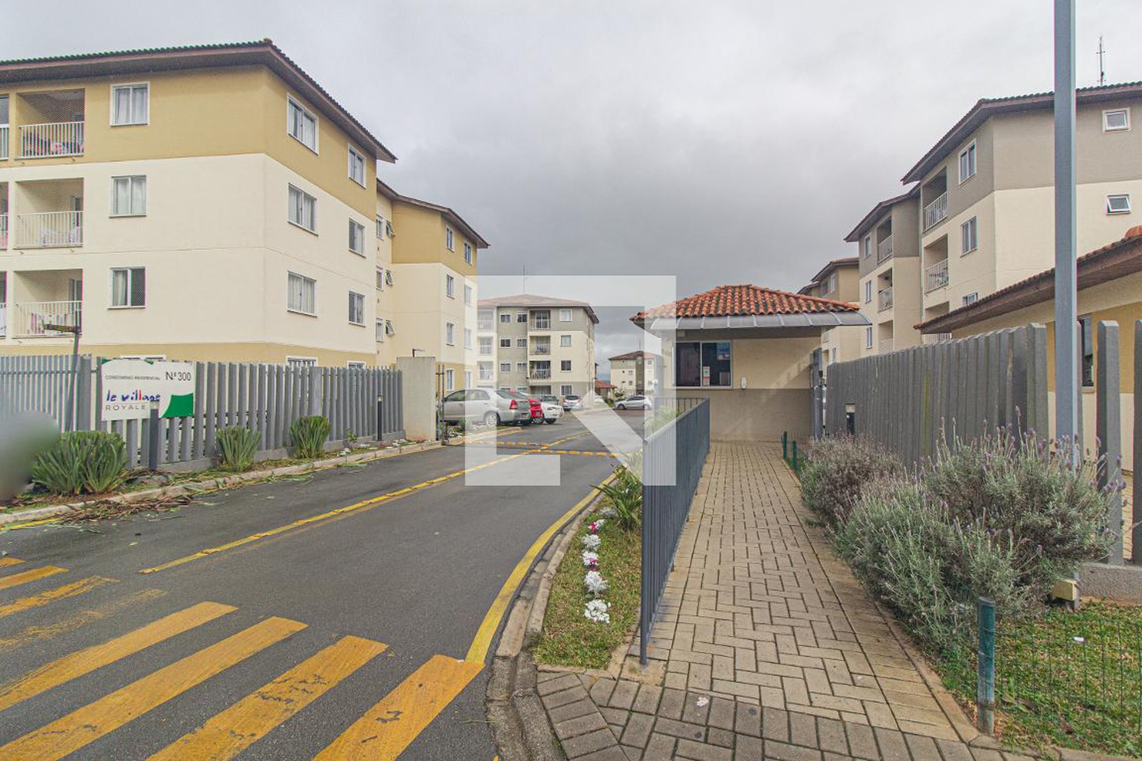 Fachada do Condomínio Condomínio Le Village Royale
