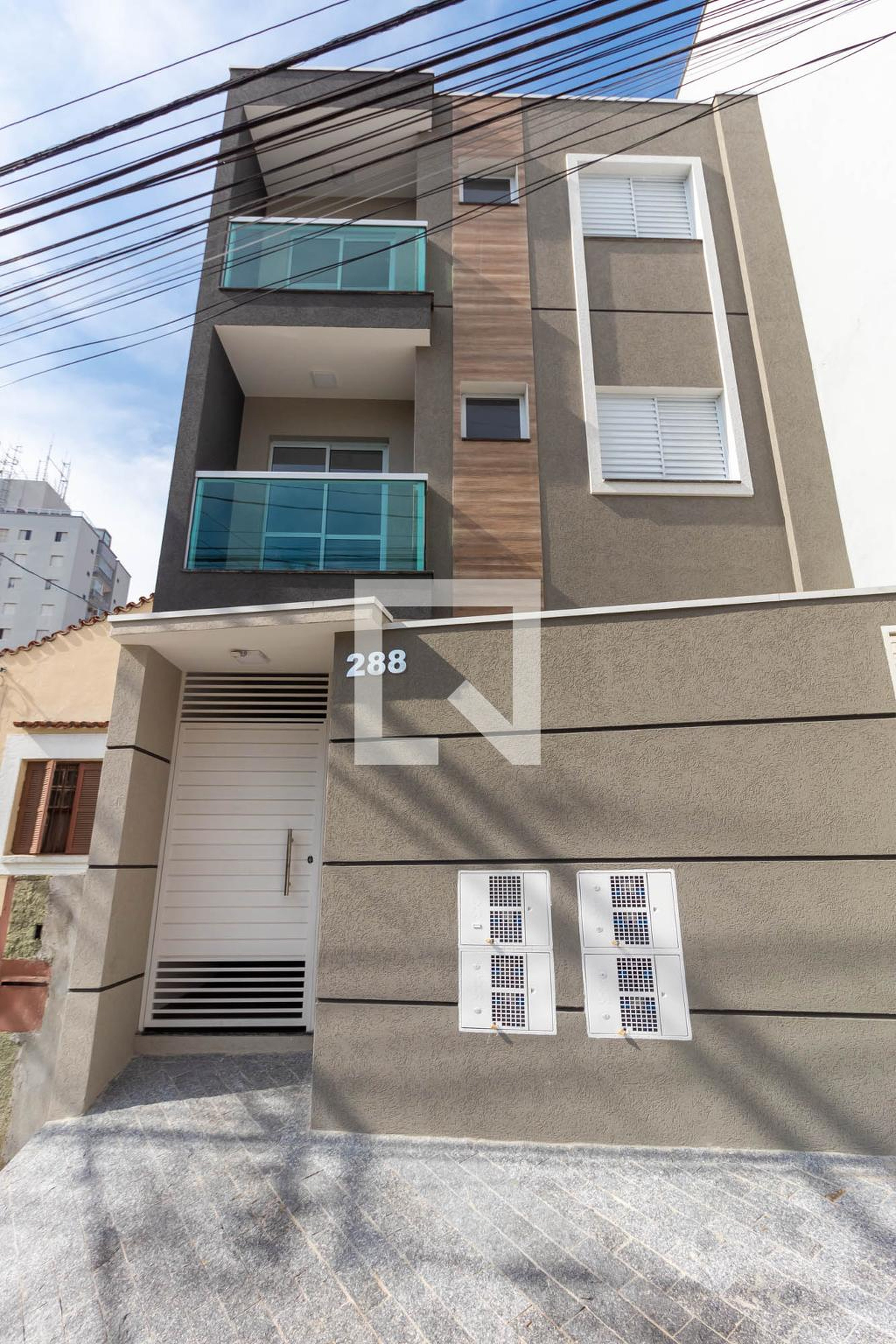 Fachada Condomínio em Rua Mandu, 288