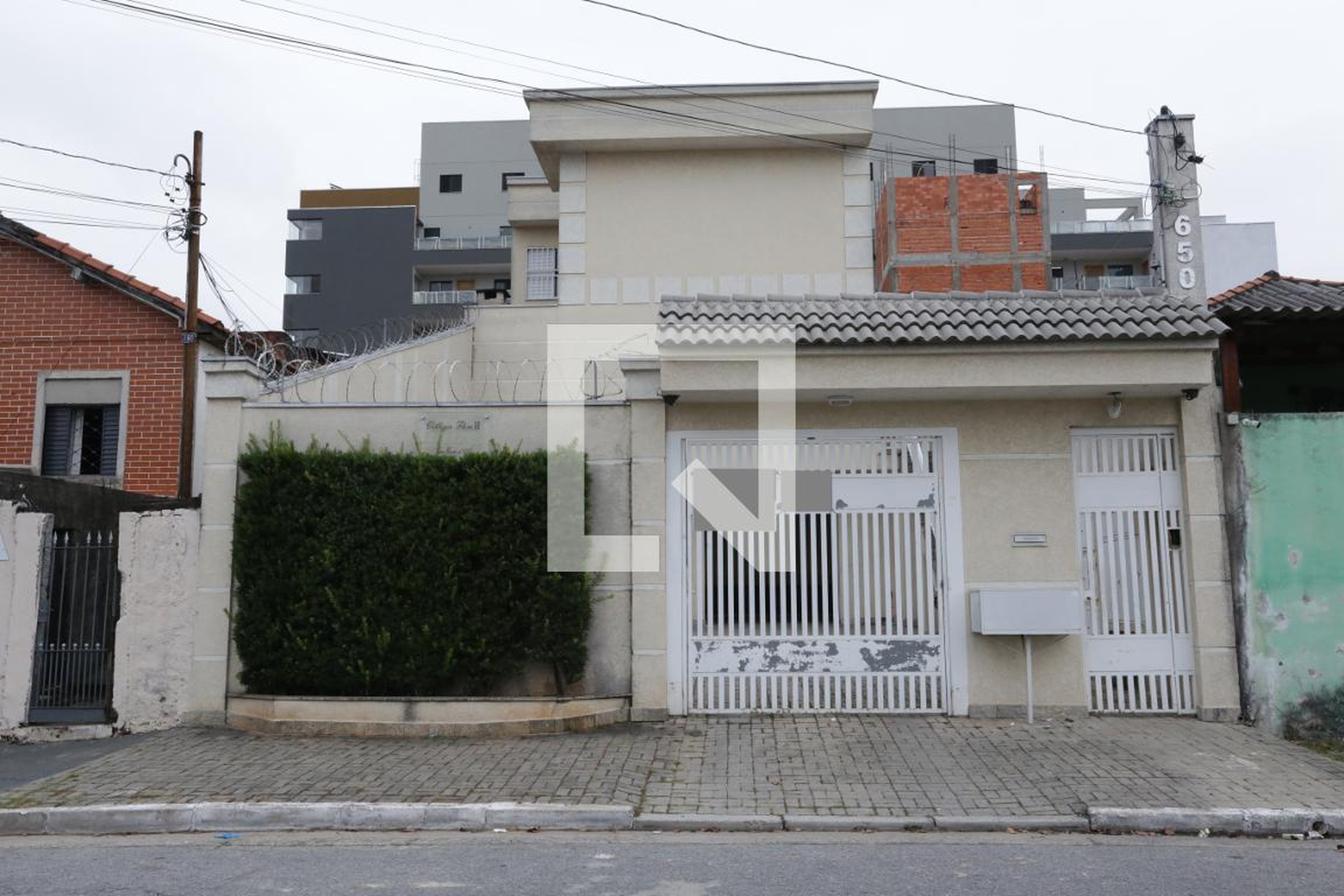 Fachada Condomínio em Rua Namé, 65
