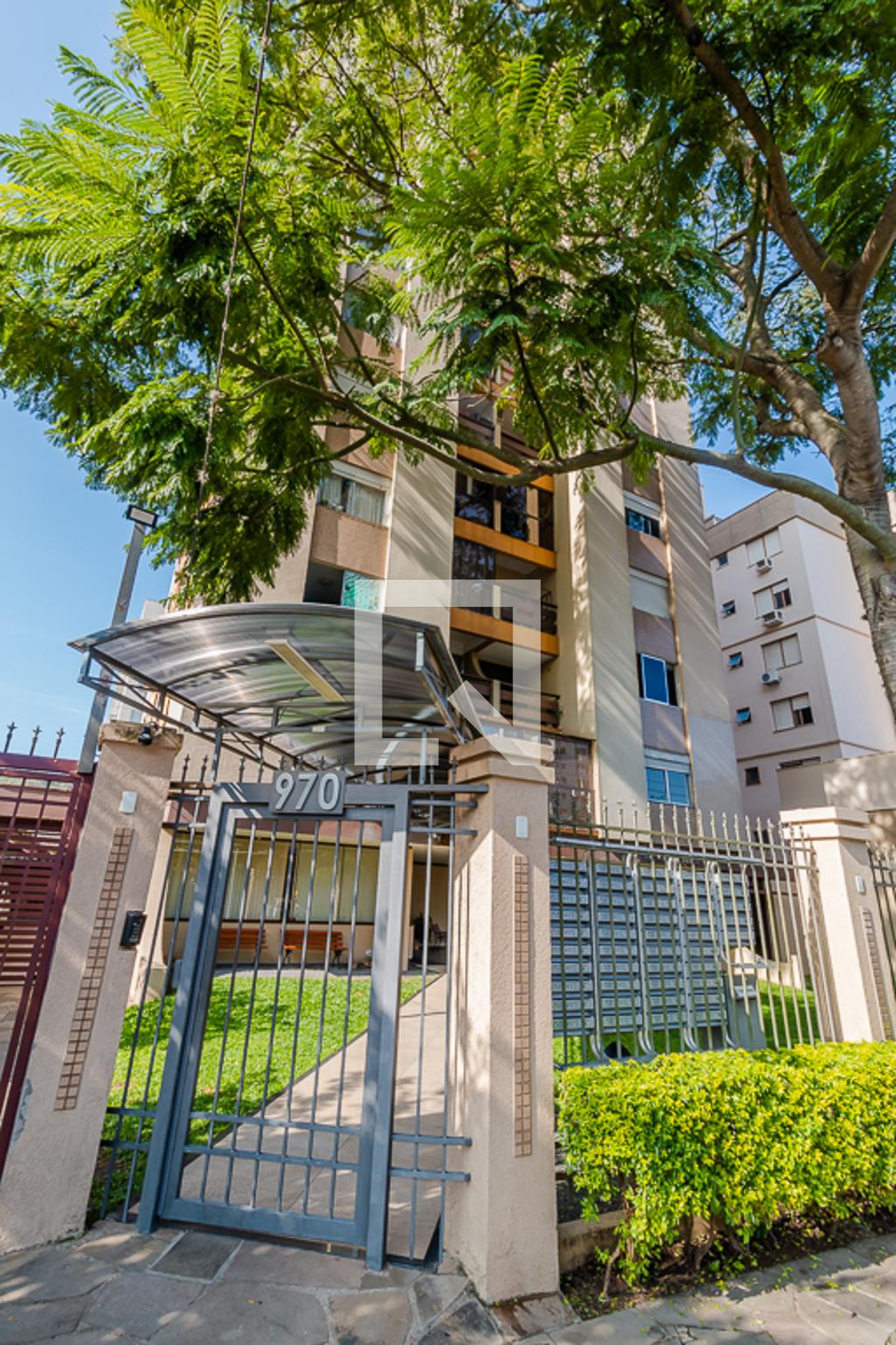 Fachada Condomínio Tour de Ville