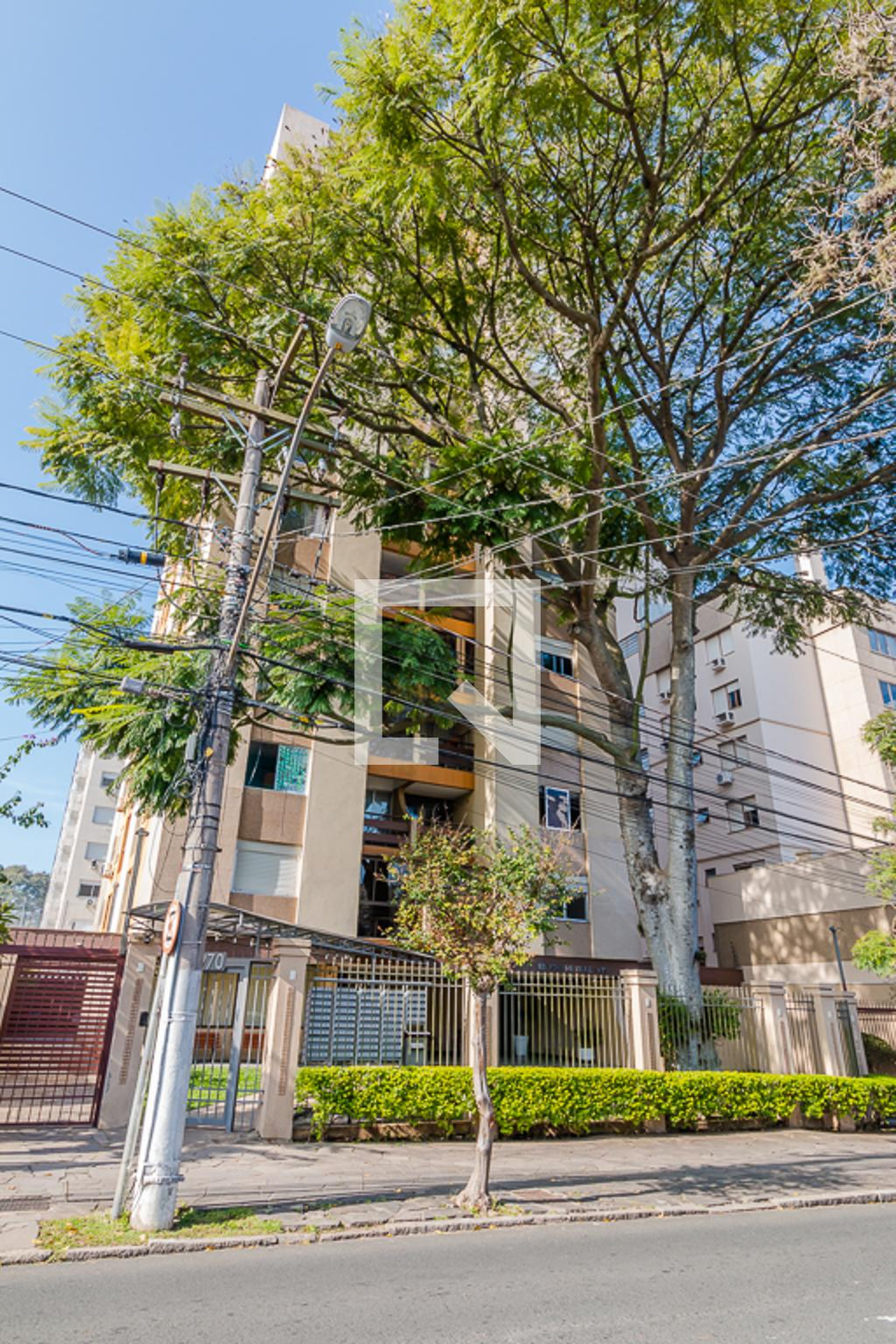 Fachada Condomínio Tour de Ville