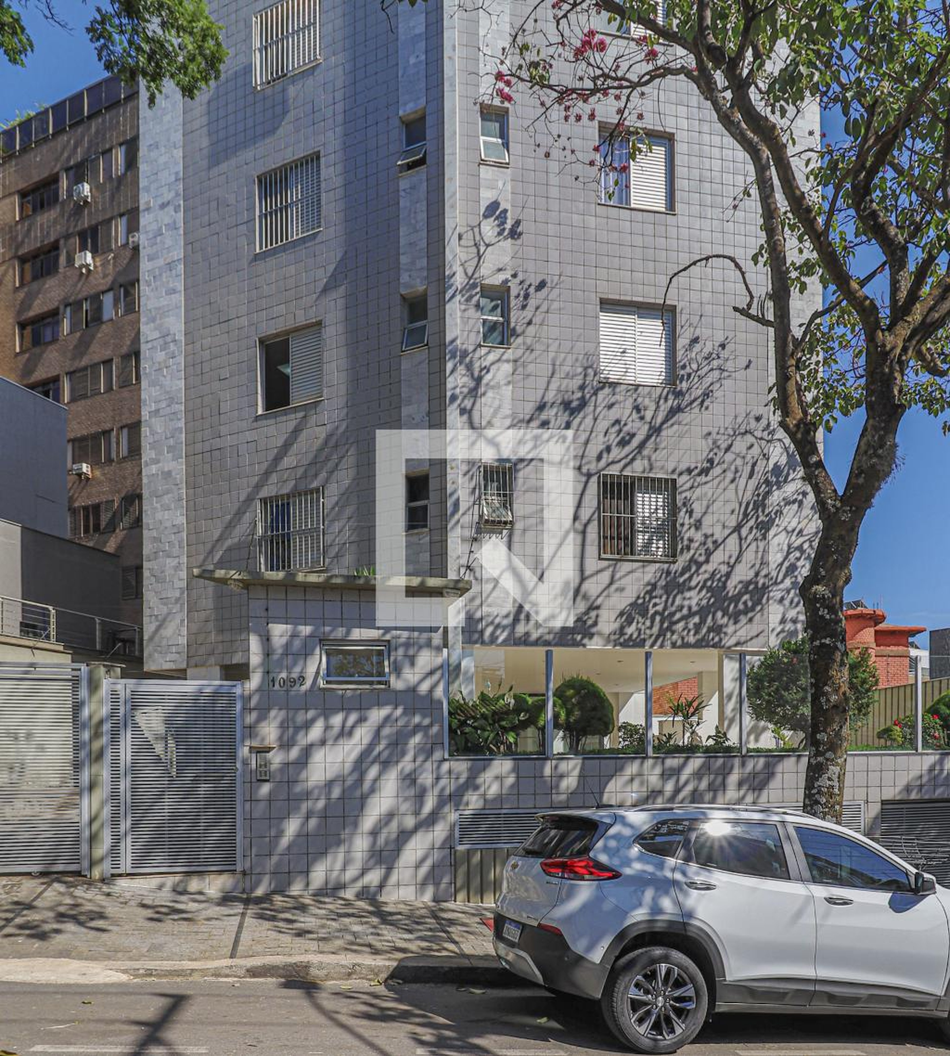 Fachada Condomínio em Rua Pium-Í, 1092