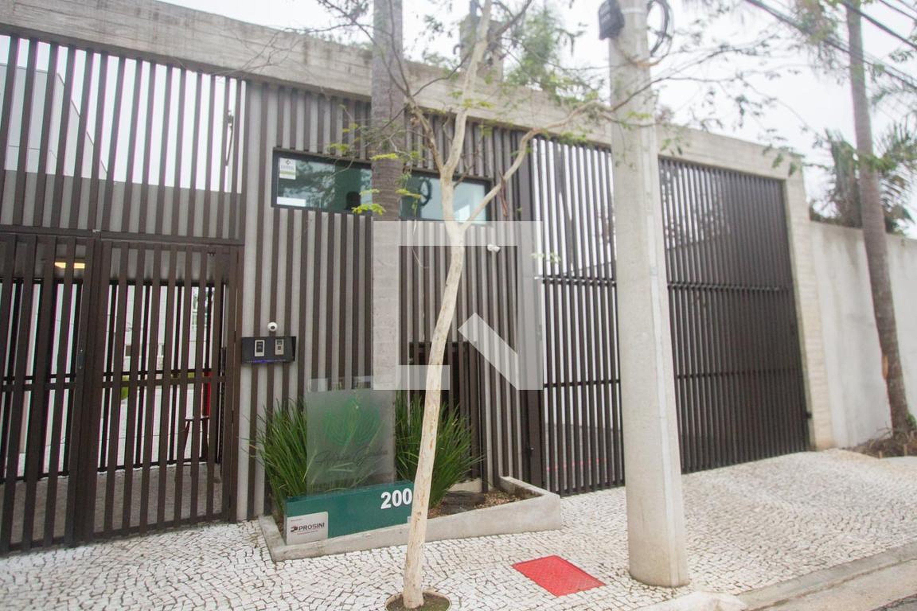 Fachada do Condomínio Condomínio Hípica Garden