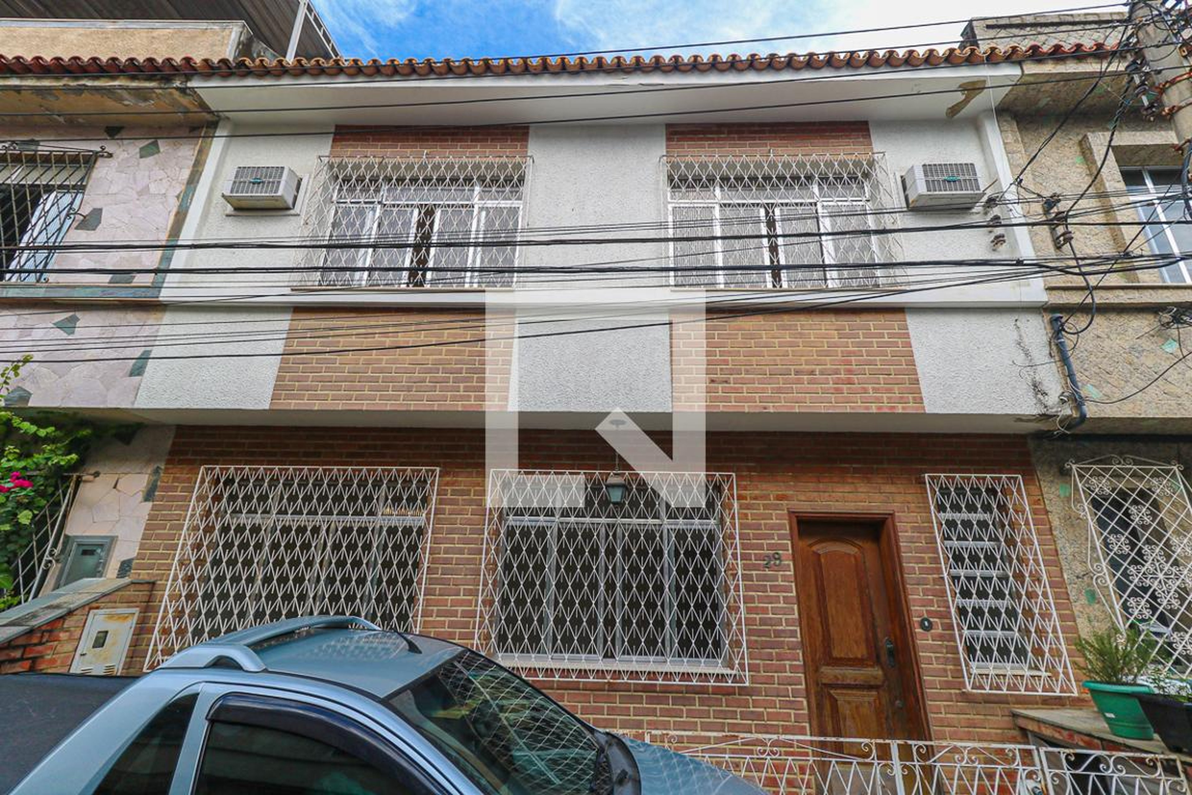 Fachada Condomínio em Rua Cachambi, 158