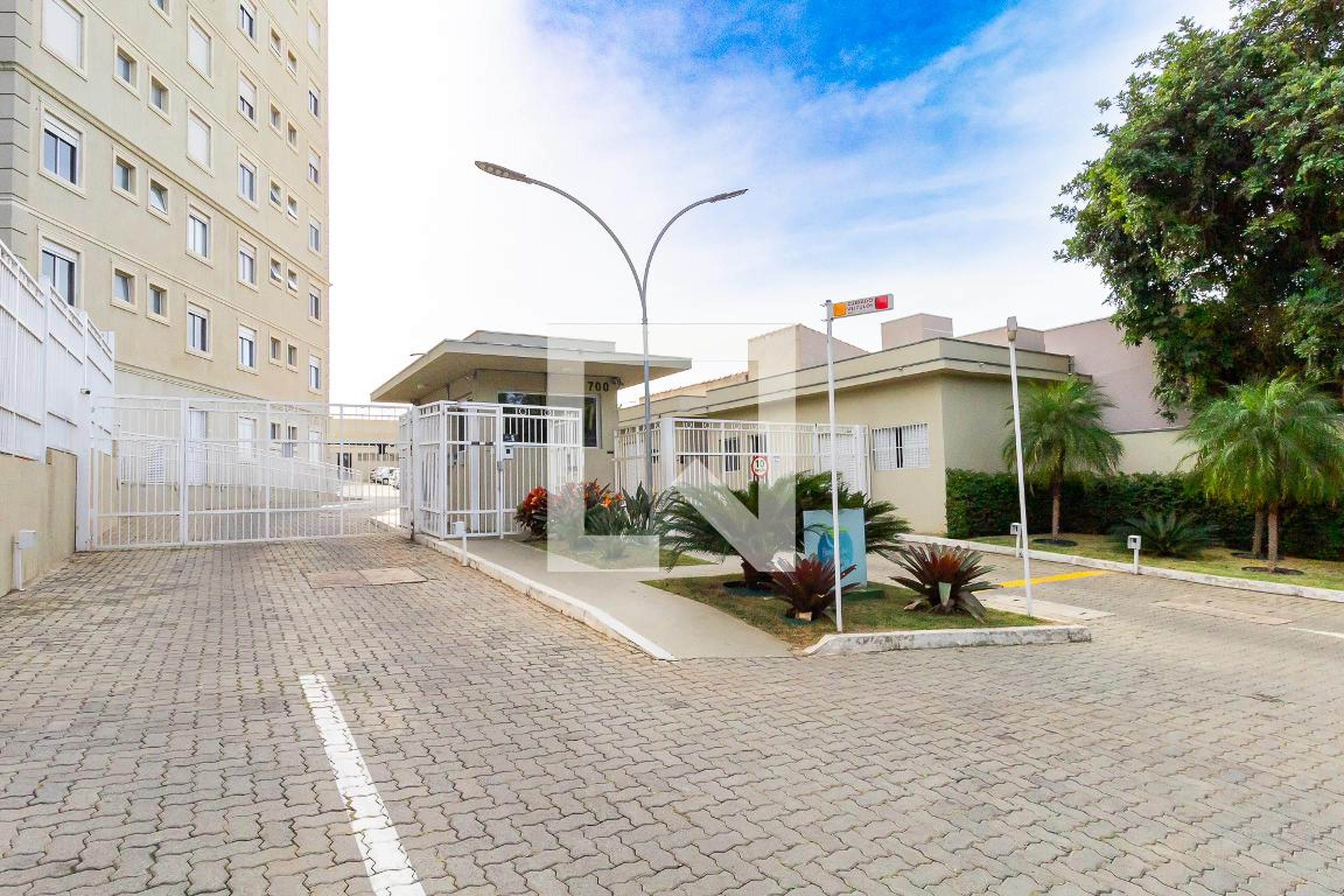 Fachada do Condomínio Condomínio Bosque dos Juritis