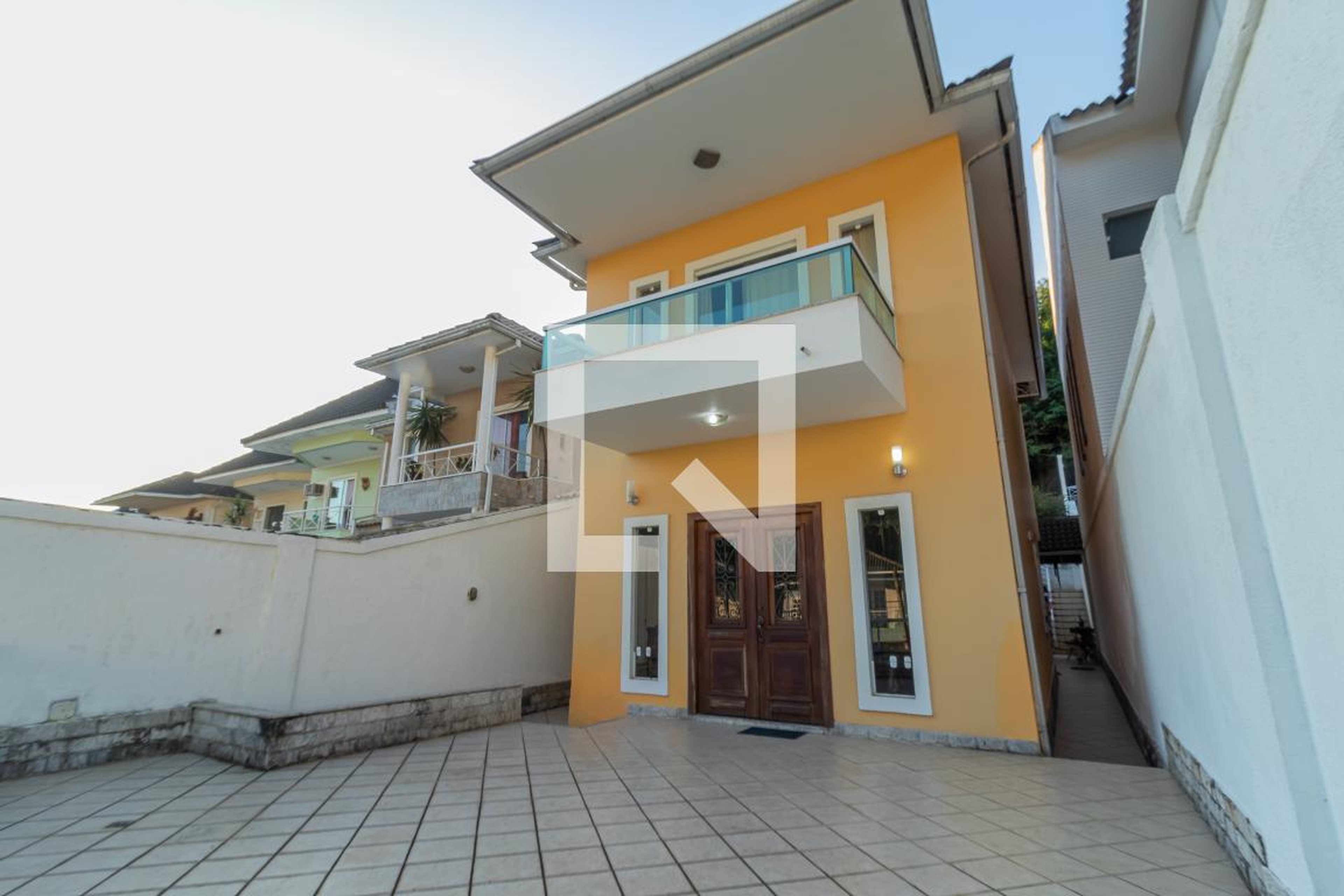 Fachada Condomínio em Rua Aricurana, 105