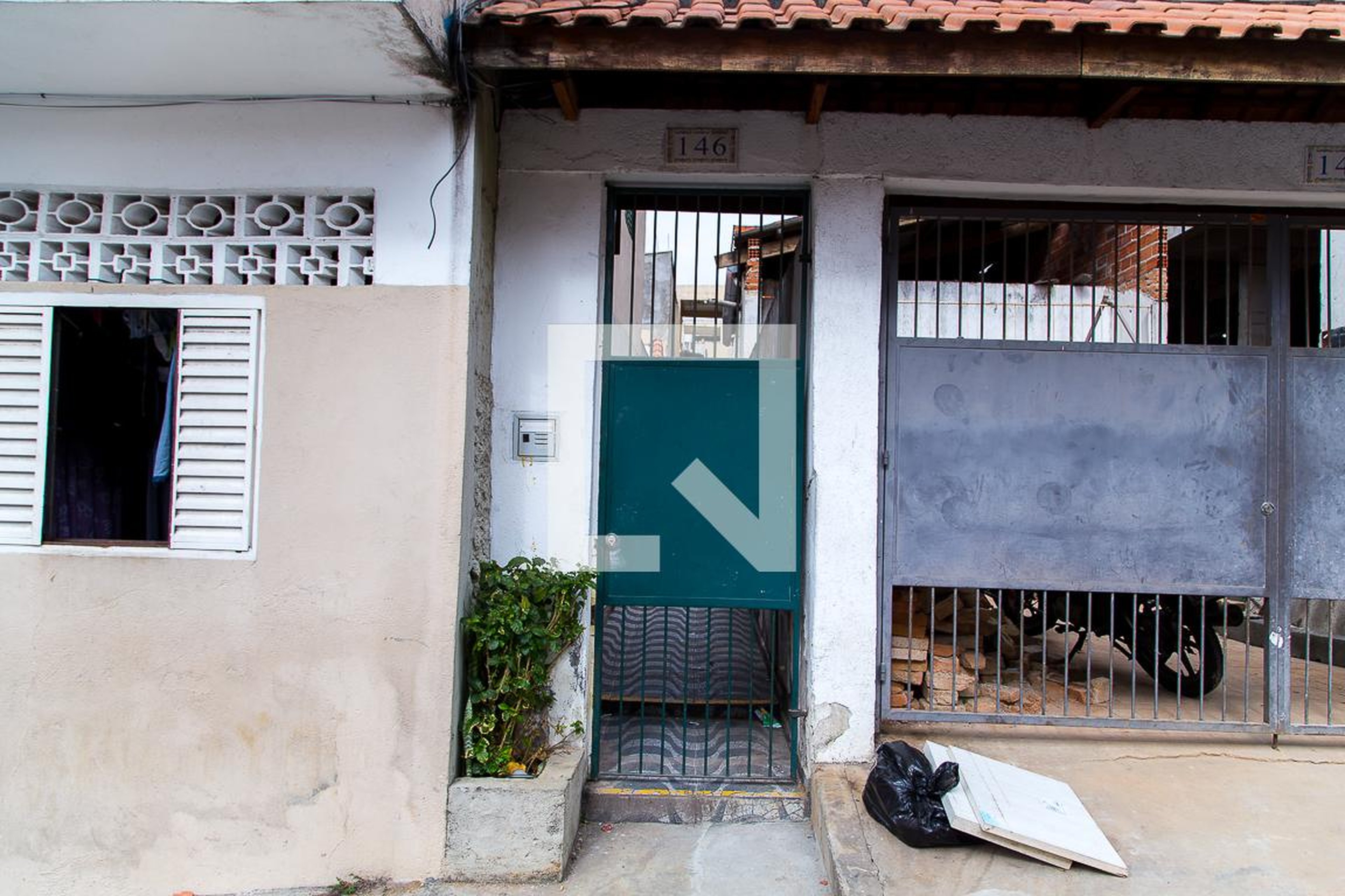 Fachada Condomínio em Rua Barra do Parateca, 146