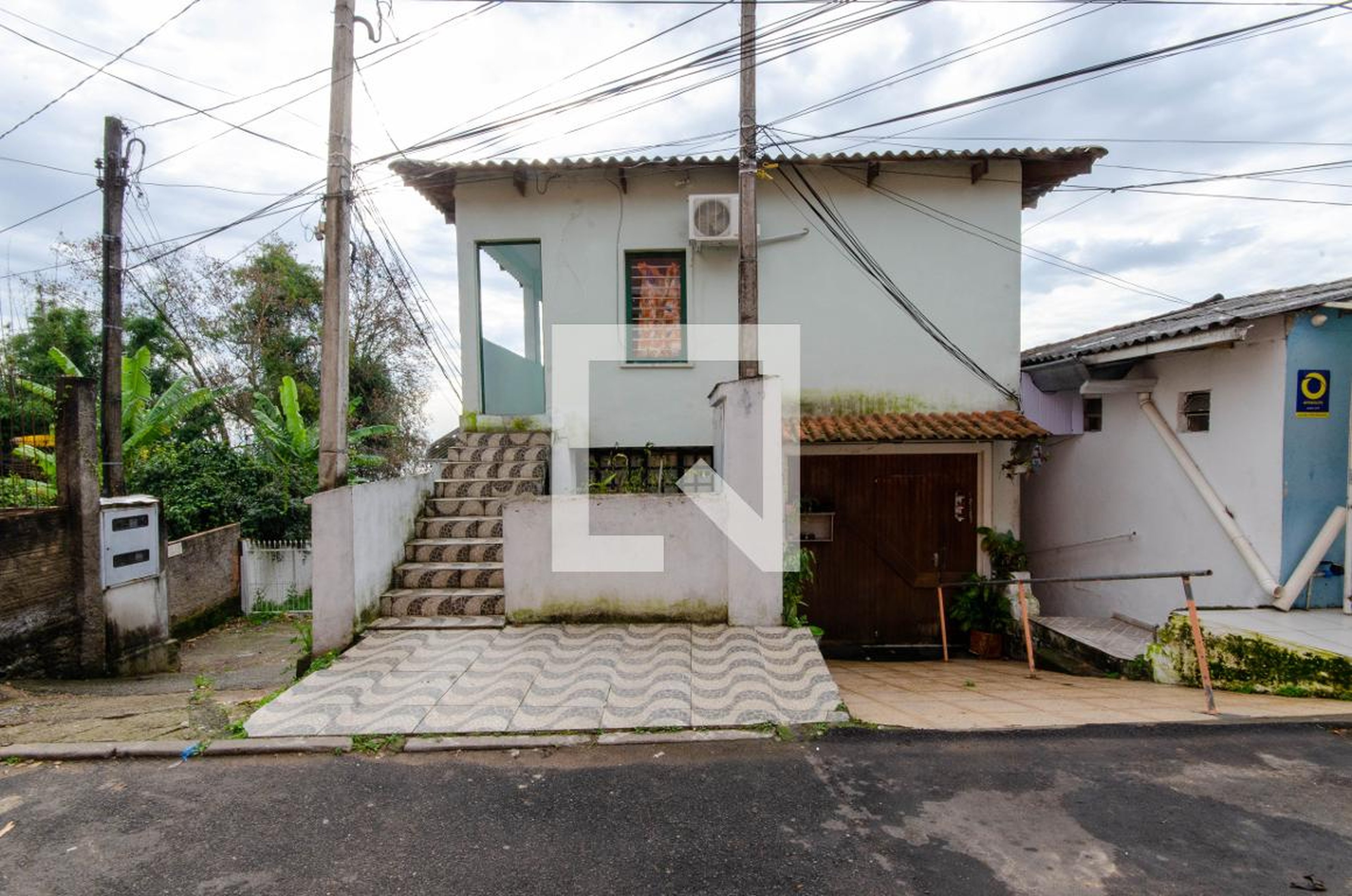 Fachada do Prédio Condomínio em Rua Bororó, 18