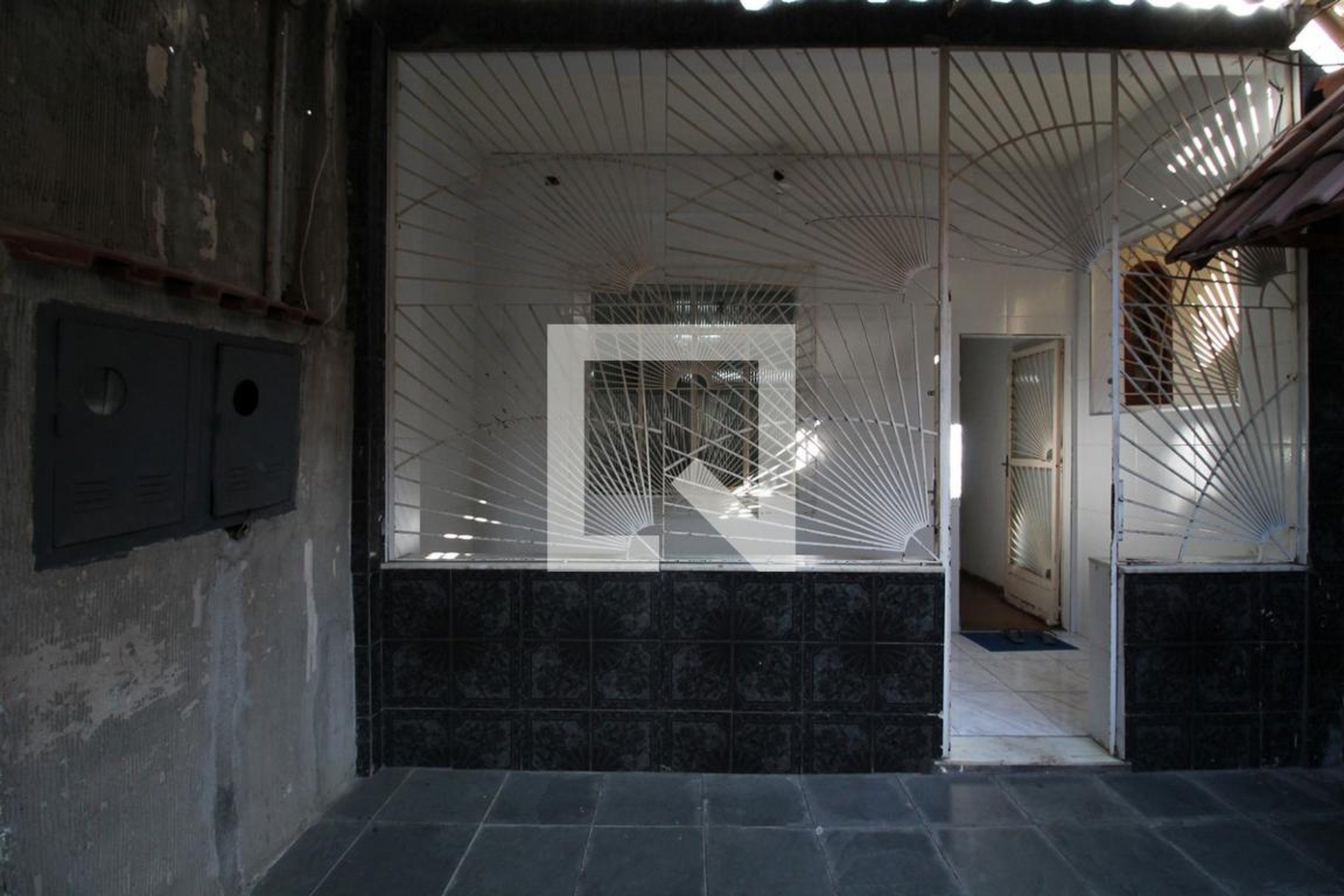 Fachada Condomínio em Rua Bororó, 77