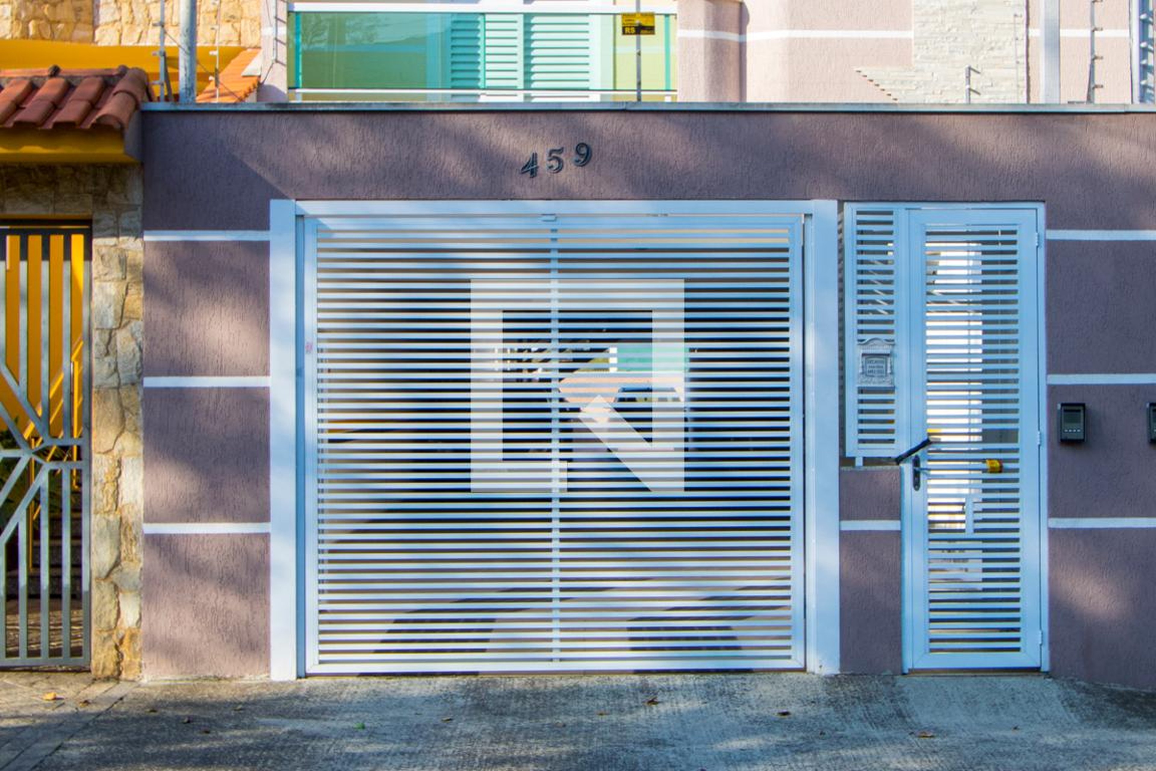 Fachada Condomínio em Rua Clélia, 459