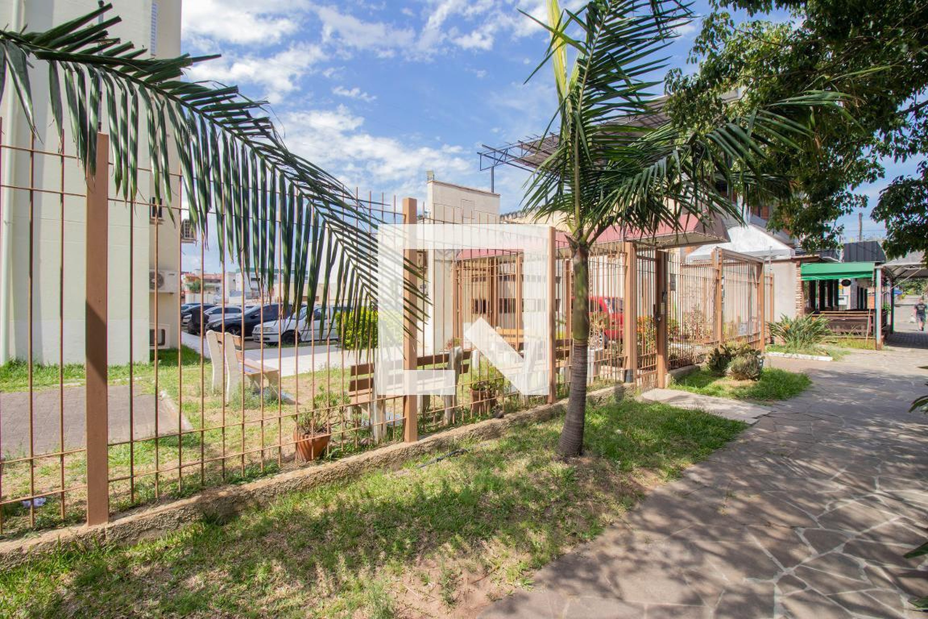 Fachada do Condomínio Condomínio Emproz