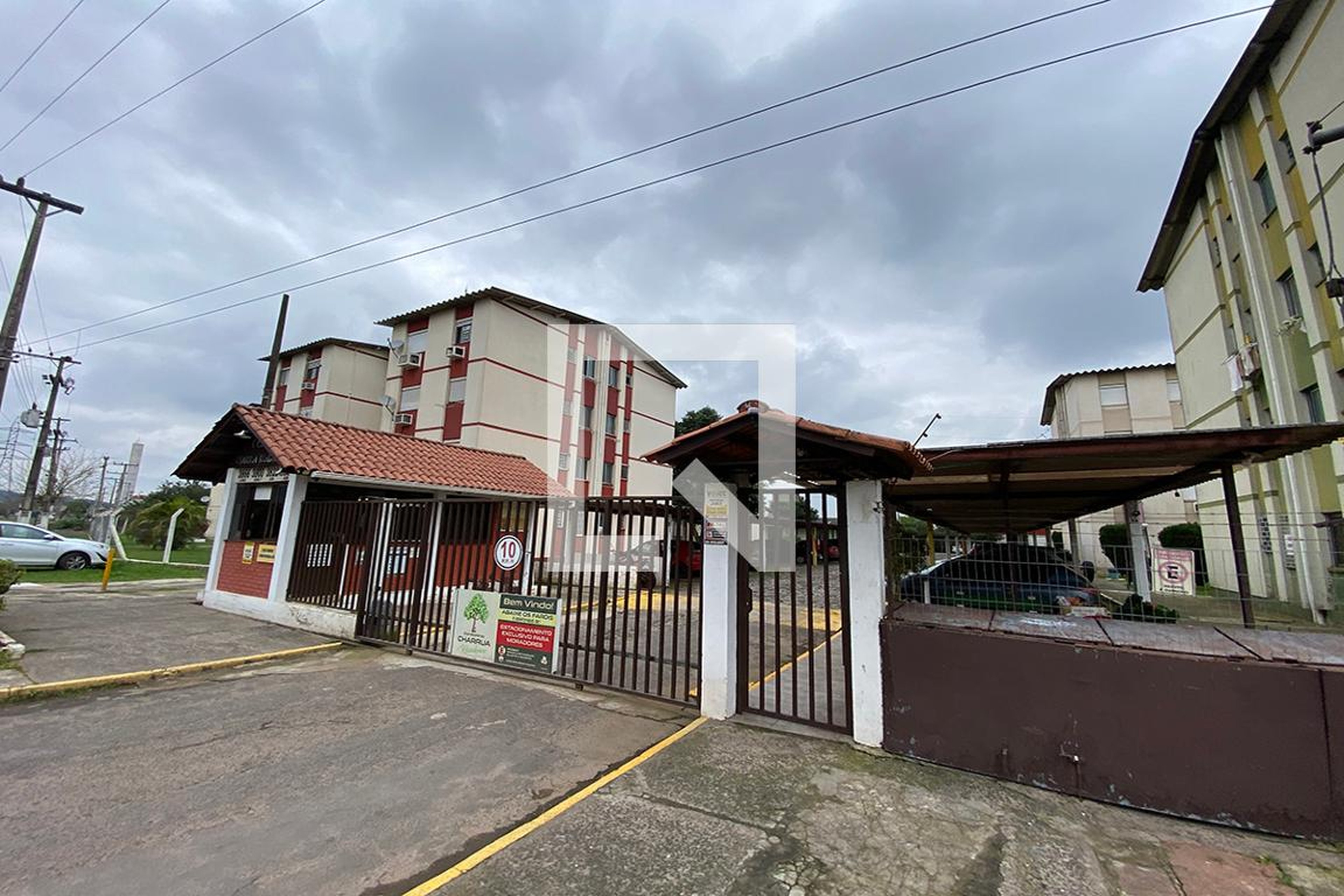 Fachada do Condomínio Condomínio Charrua II