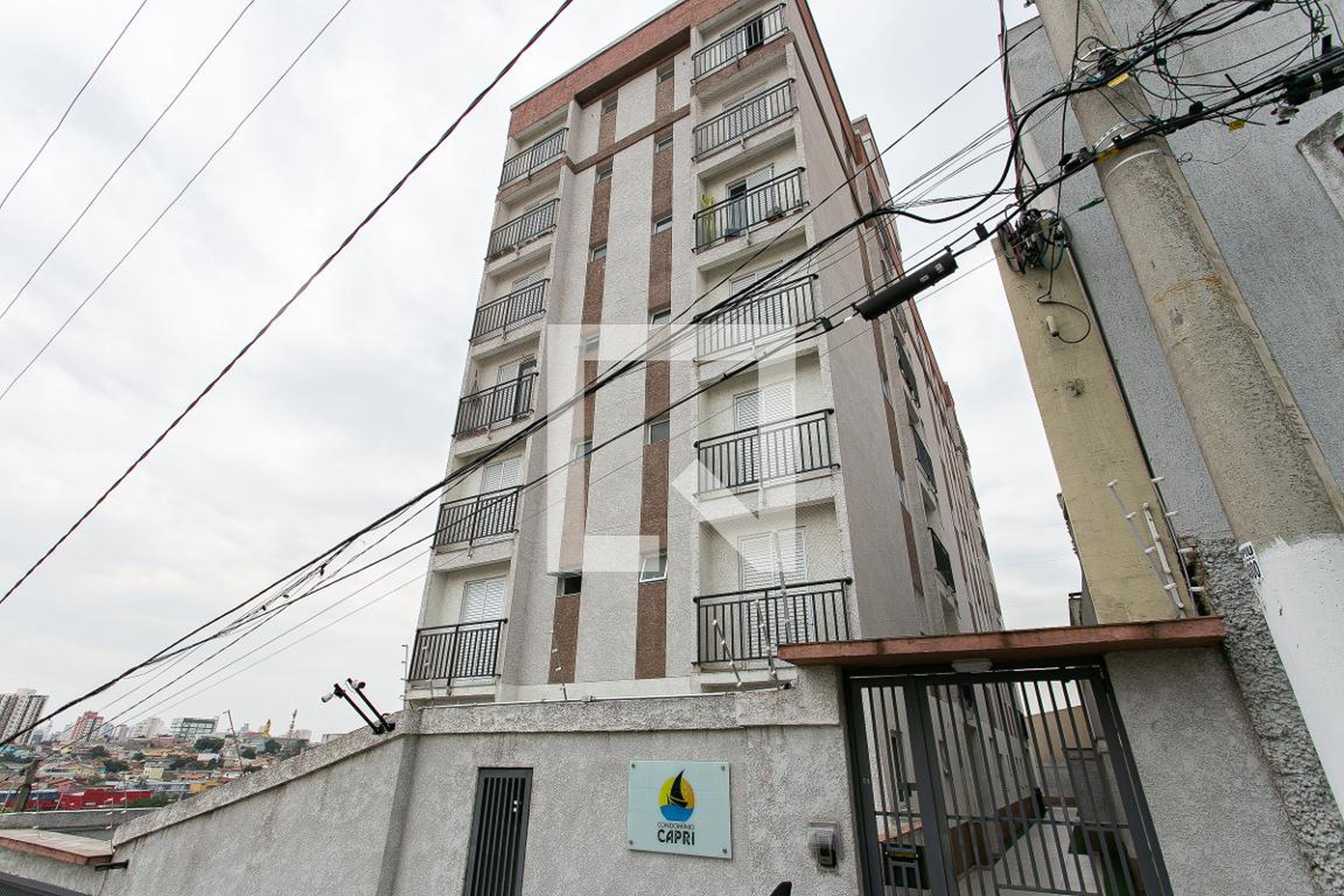 Fachada do Condomínio Condomínio Capri