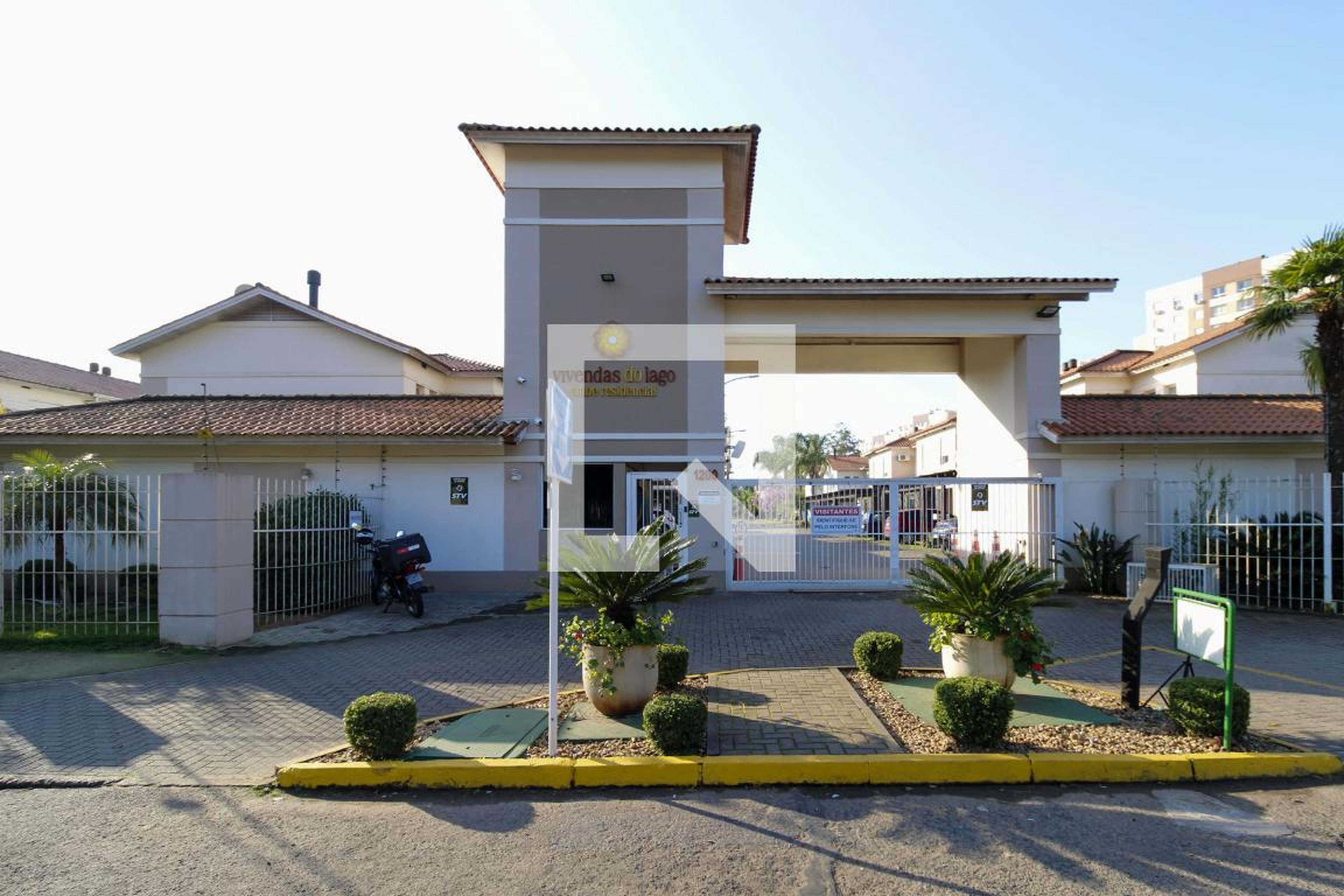 Fachada do Condomínio Condomínio Vivendas do Lago