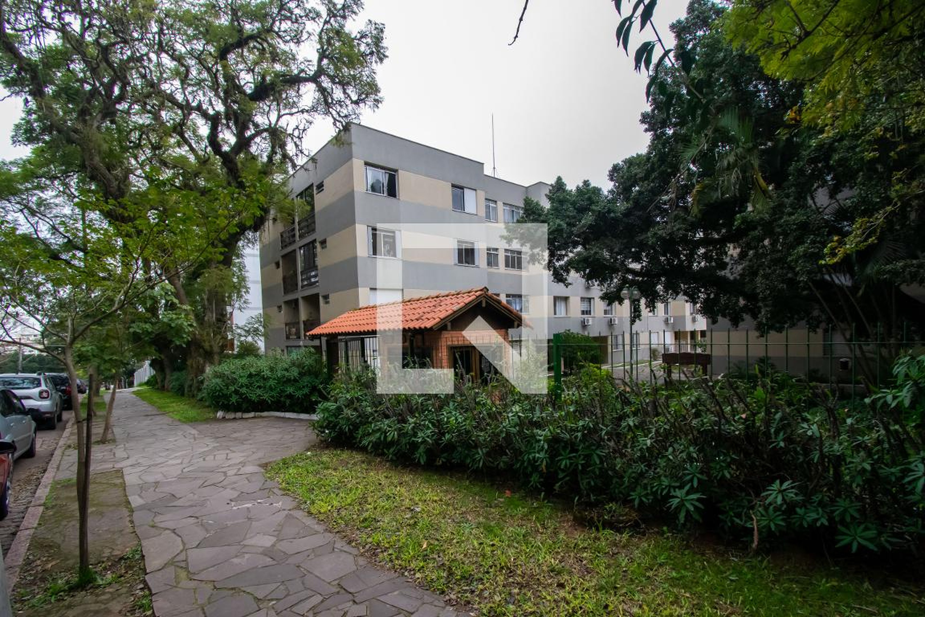 Fachada do Condomínio Condomínio Parque das Figueiras