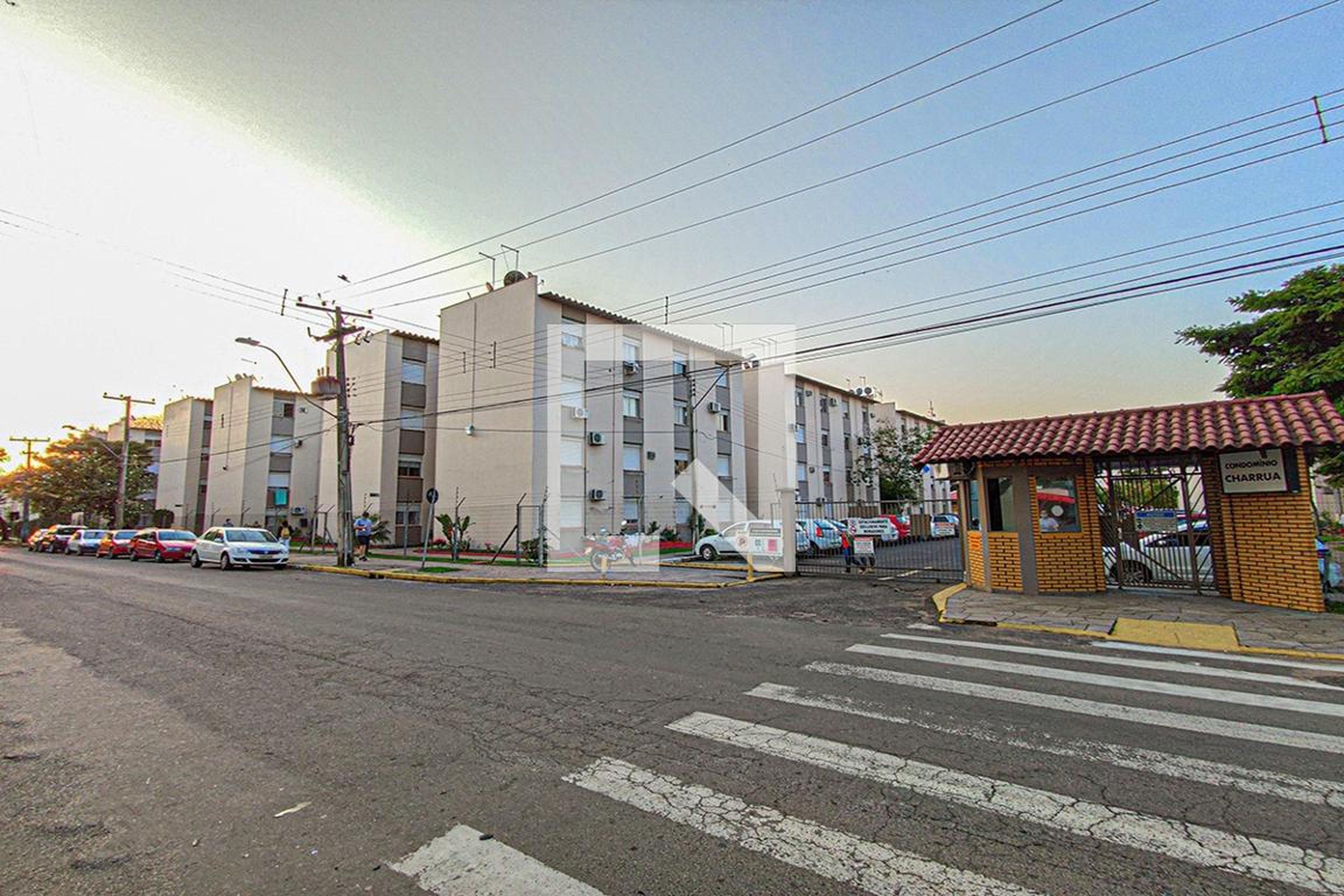 Fachada do Condomínio Condomínio Charrua