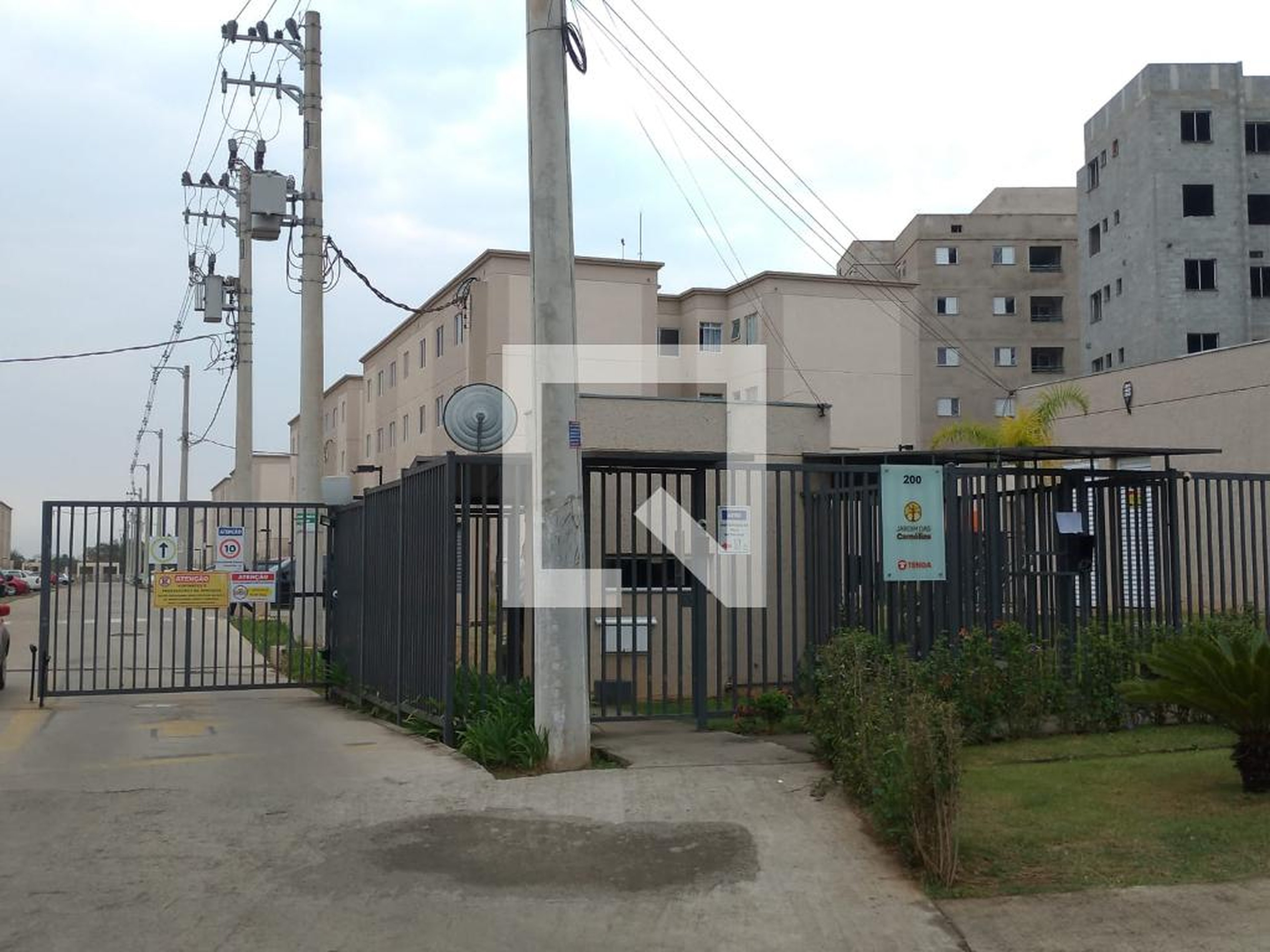 Fachada do Condomínio Condomínio Jardim das Camélias