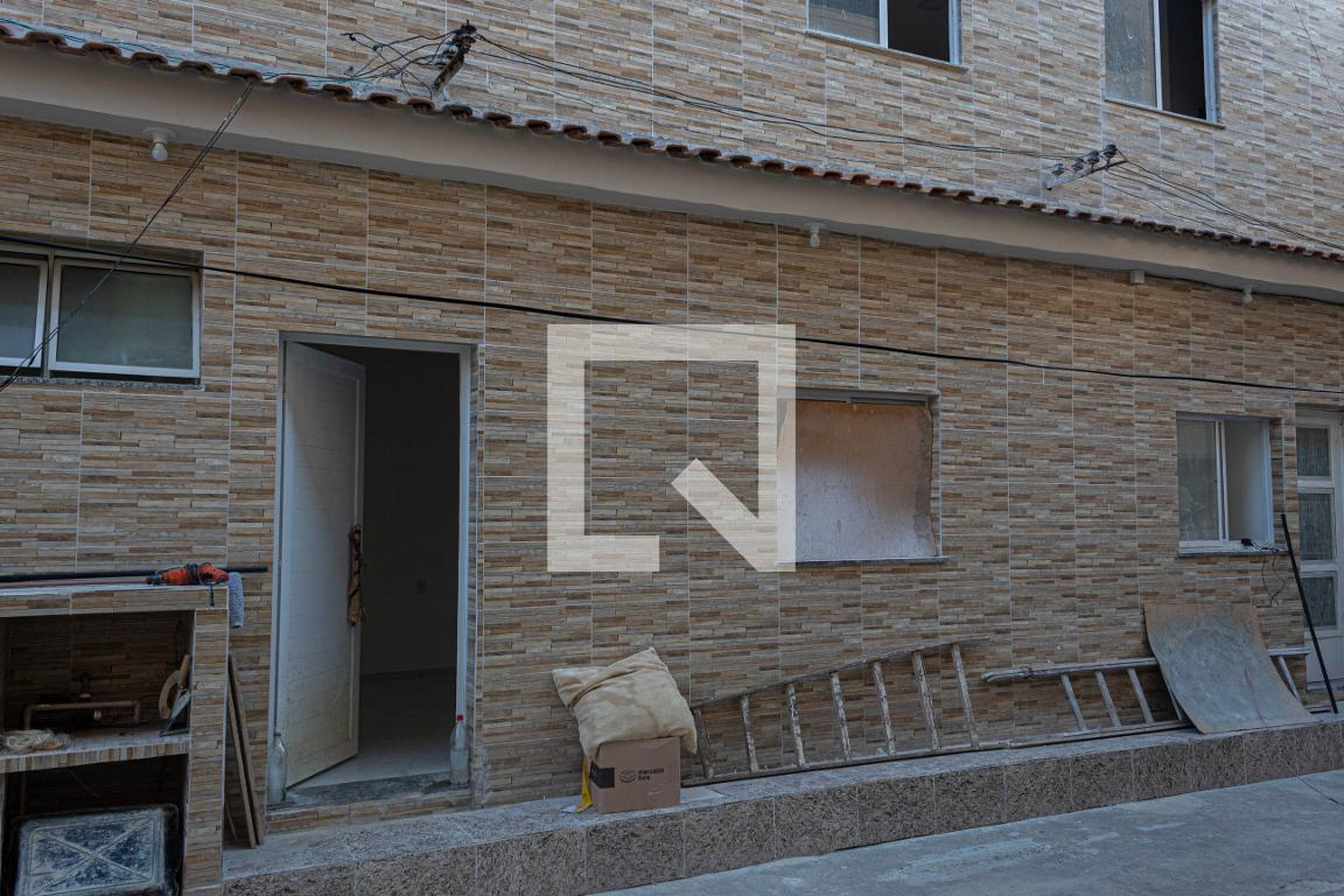 Fachada Condomínio em Rua José Higino, 105