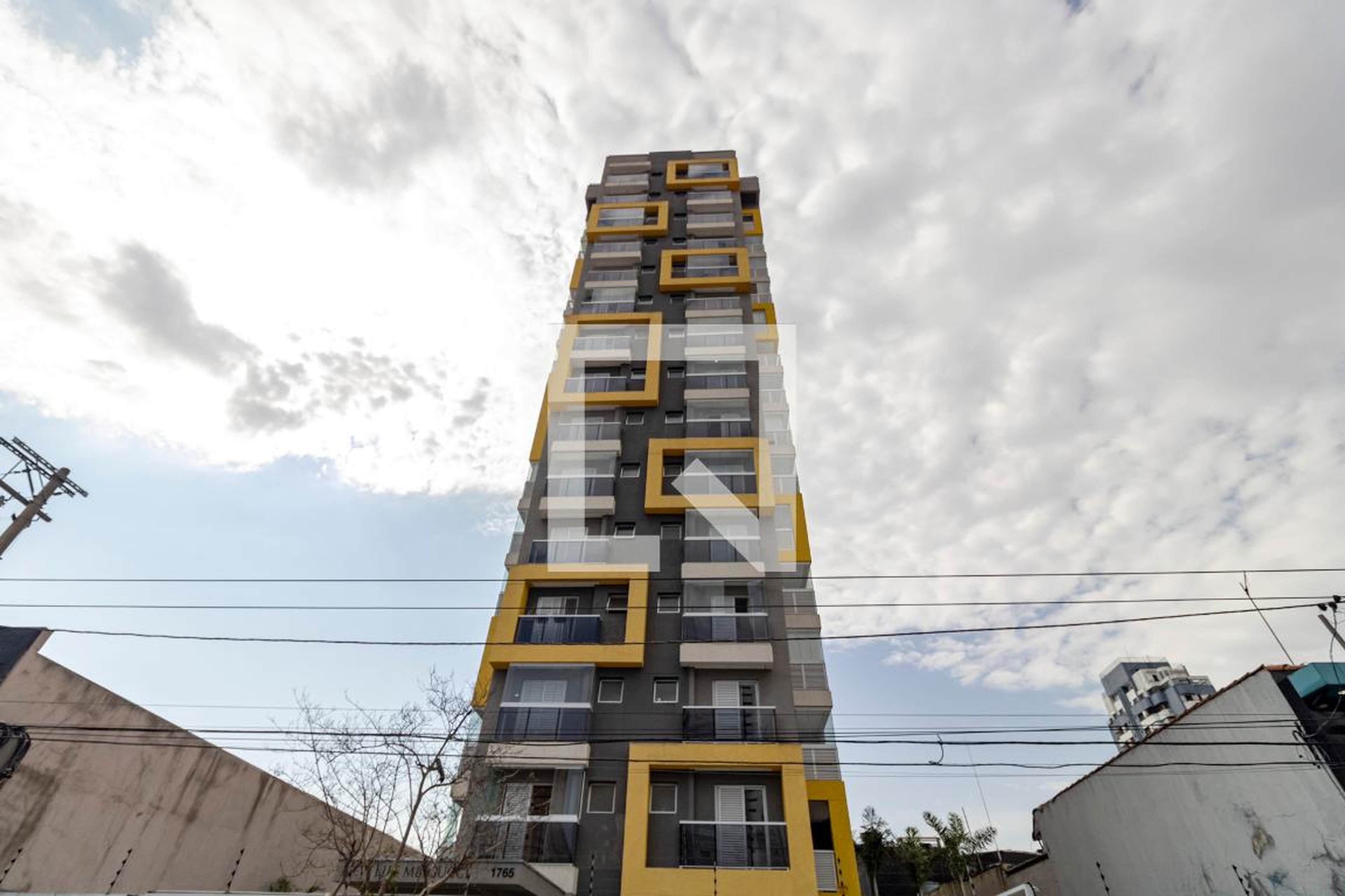 Fachada do Condomínio Condomínio New Life Mbigucci