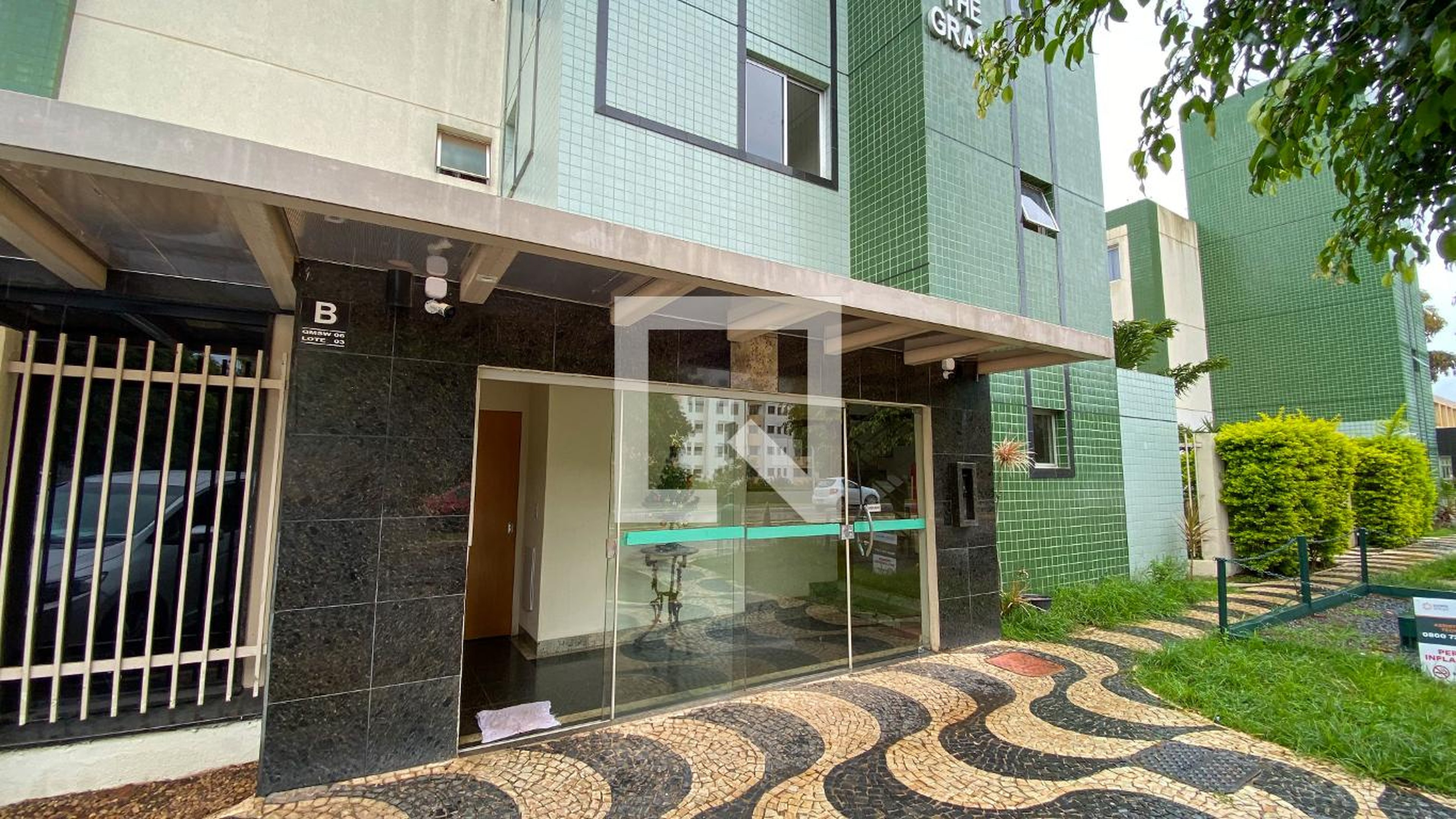 Fachada Condomínio em Qmsw 6, 03