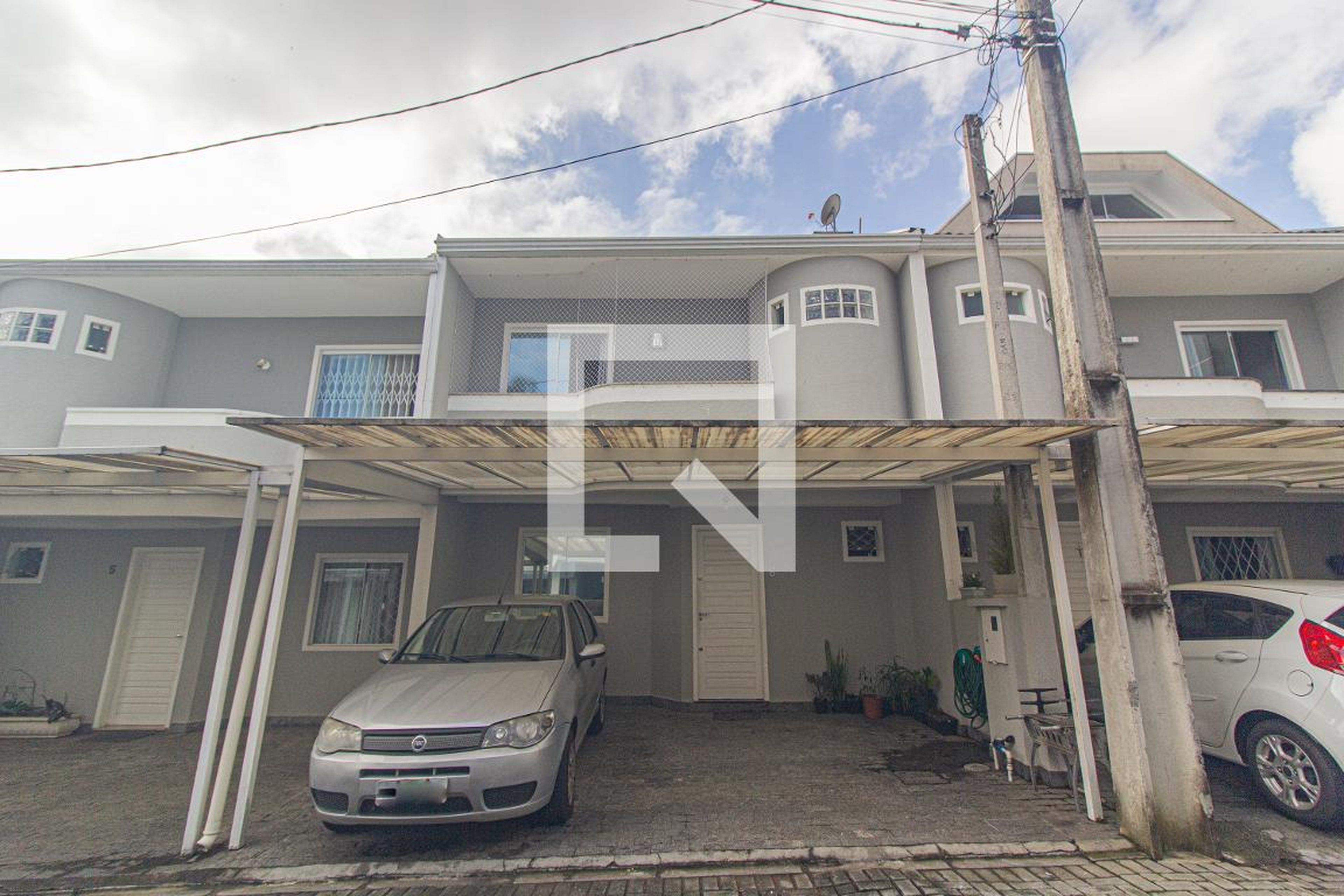 Fachada Condomínio em Rua Vicente Geronasso, 58