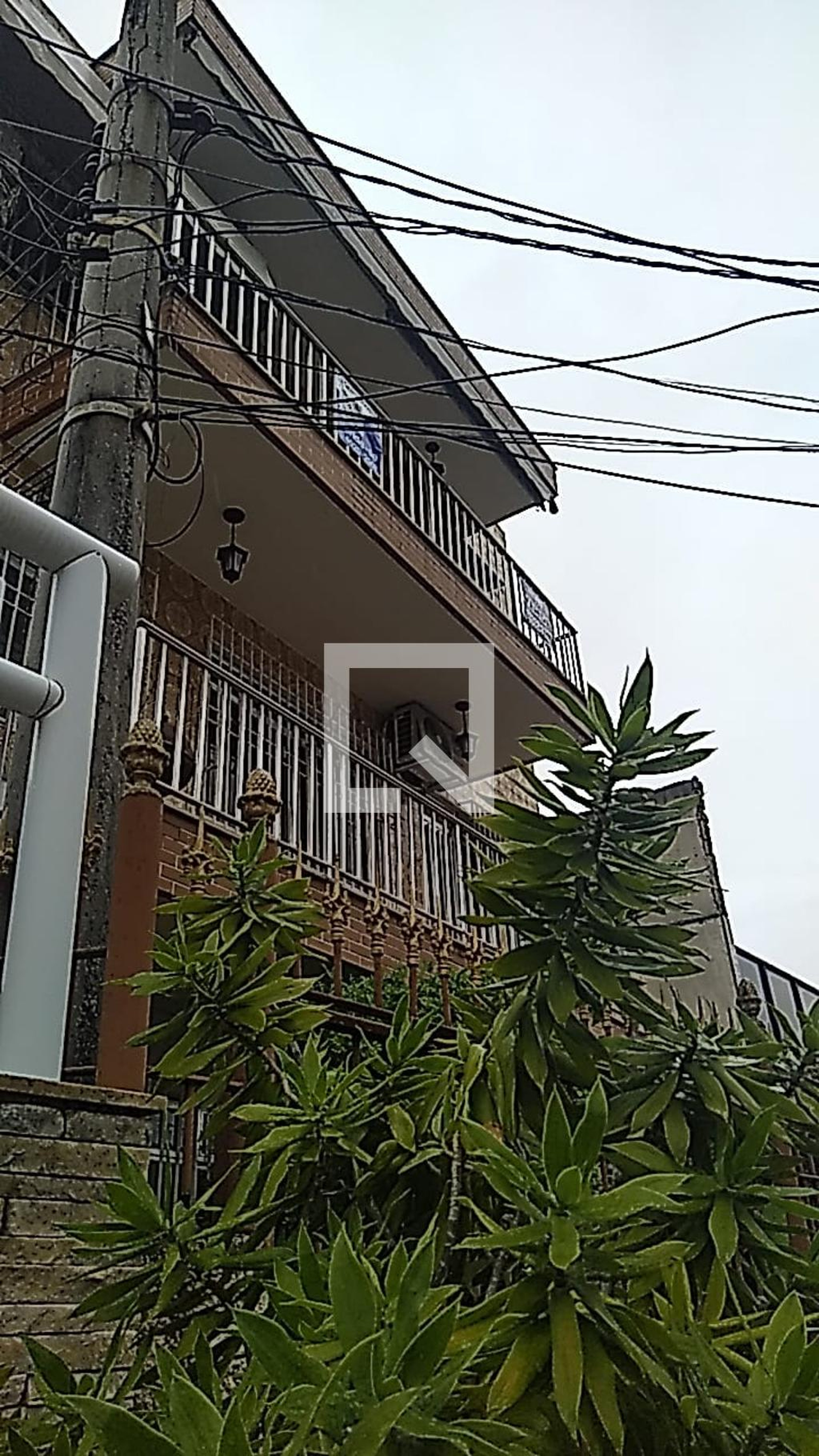 Fachada Condomínio em Rua Domingos Caruso, 22