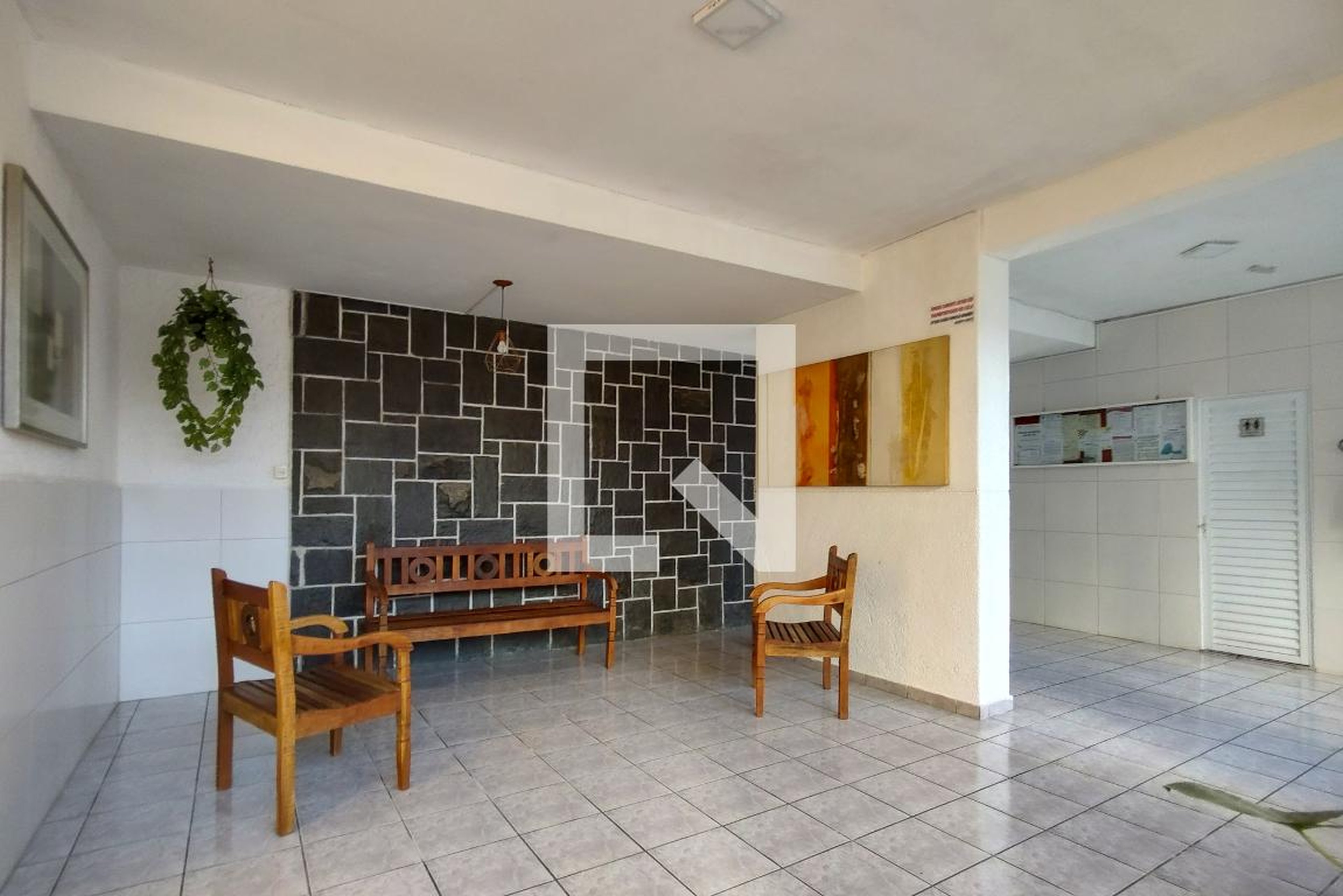Hall de entrada Condomínio em Rua Caiapós, 87