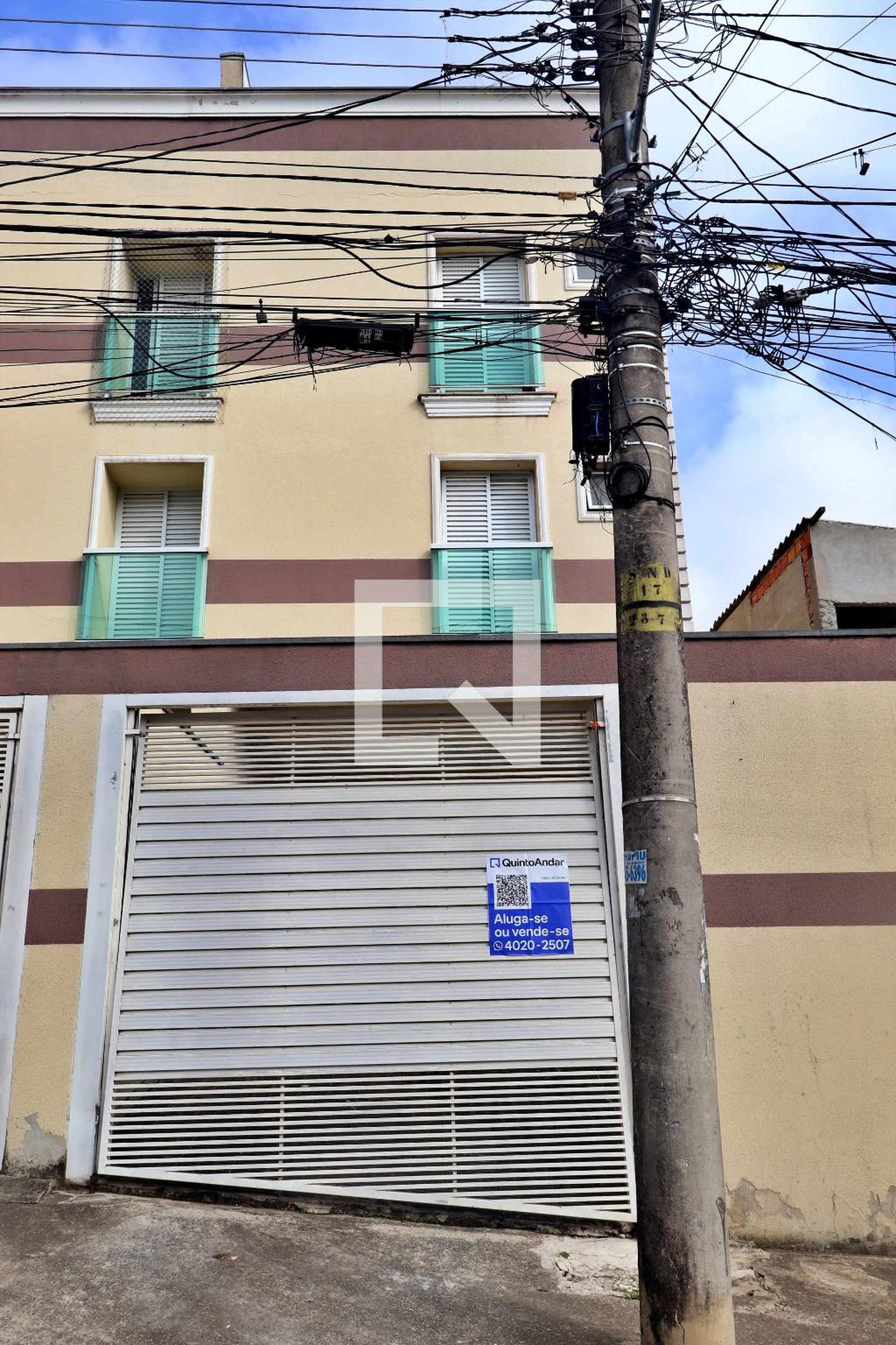 Fachada Condomínio em Rua Milão, 443