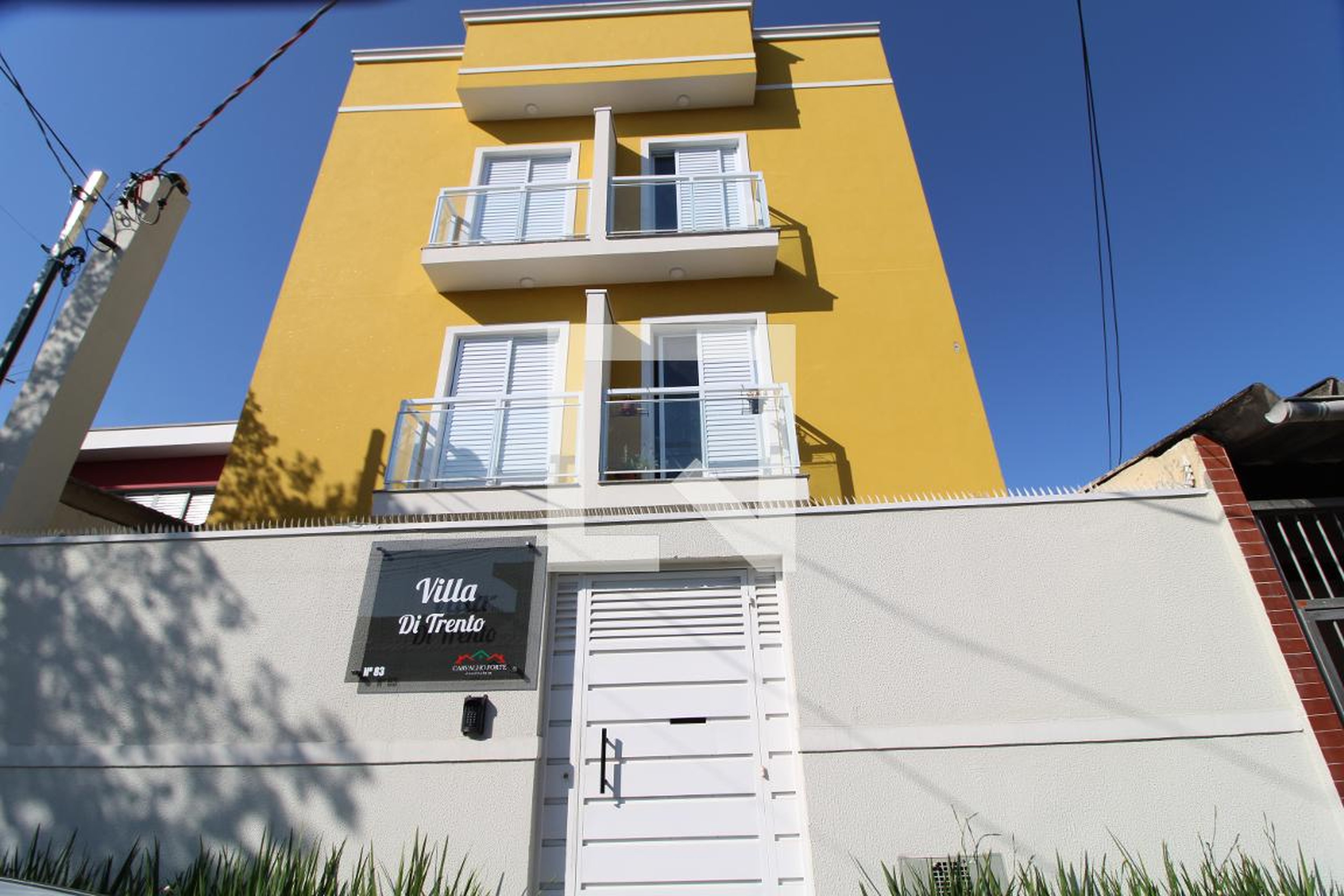 Fachada Condomínio Villa di Trento