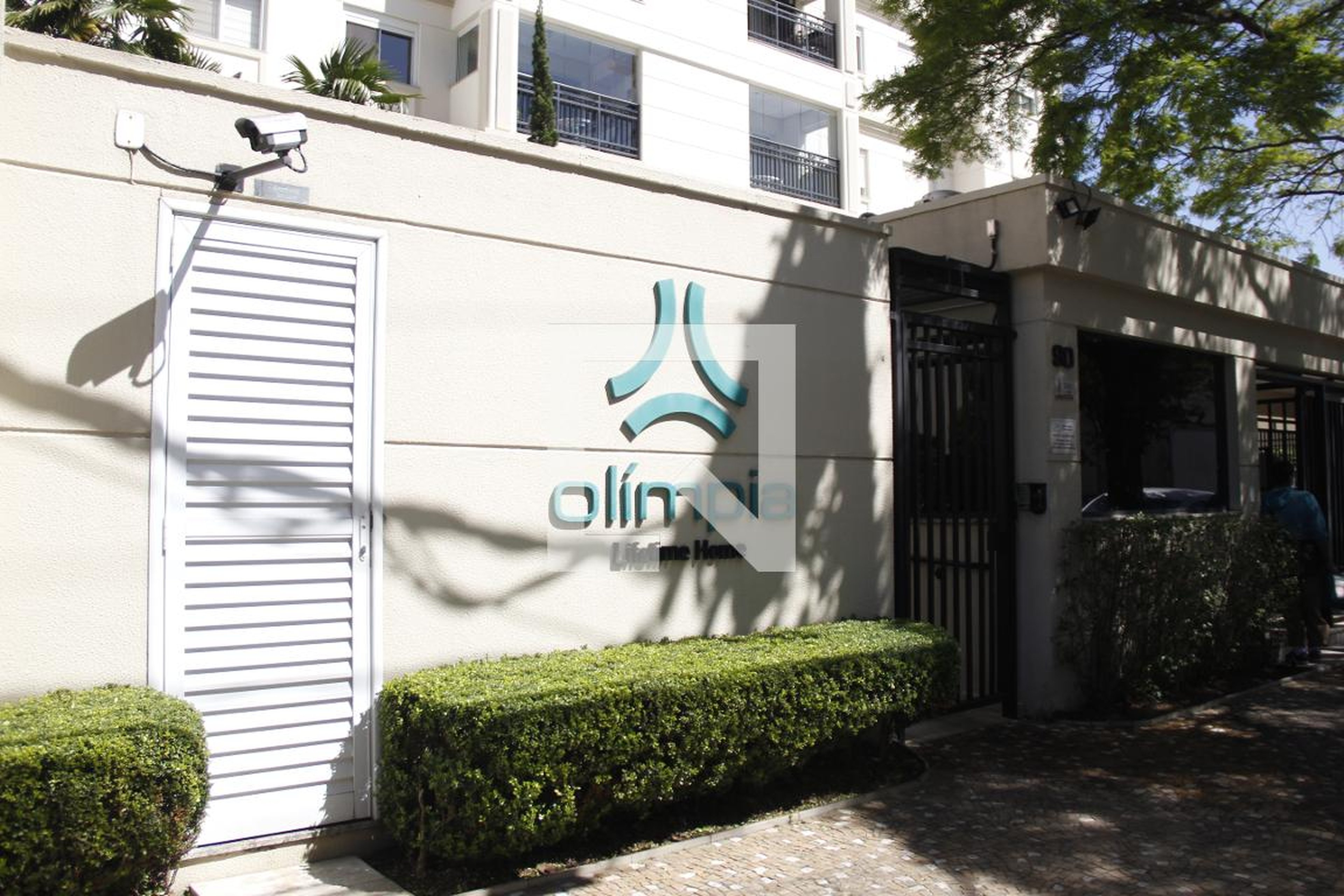 Fachada do Condomínio Condomínio Olímpia Lifetime Home