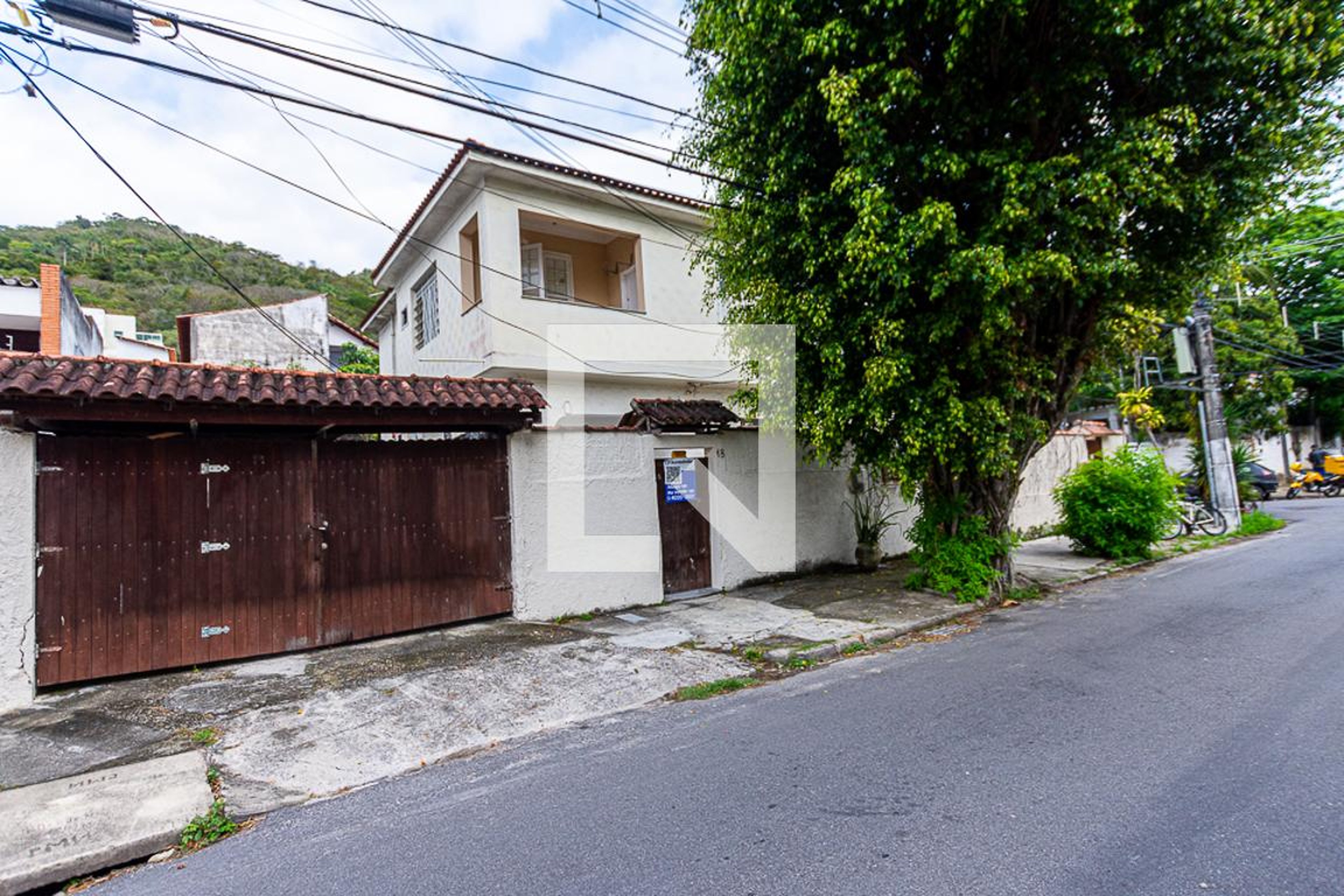 Fachada Condomínio em Rua Euríco Batista, 16