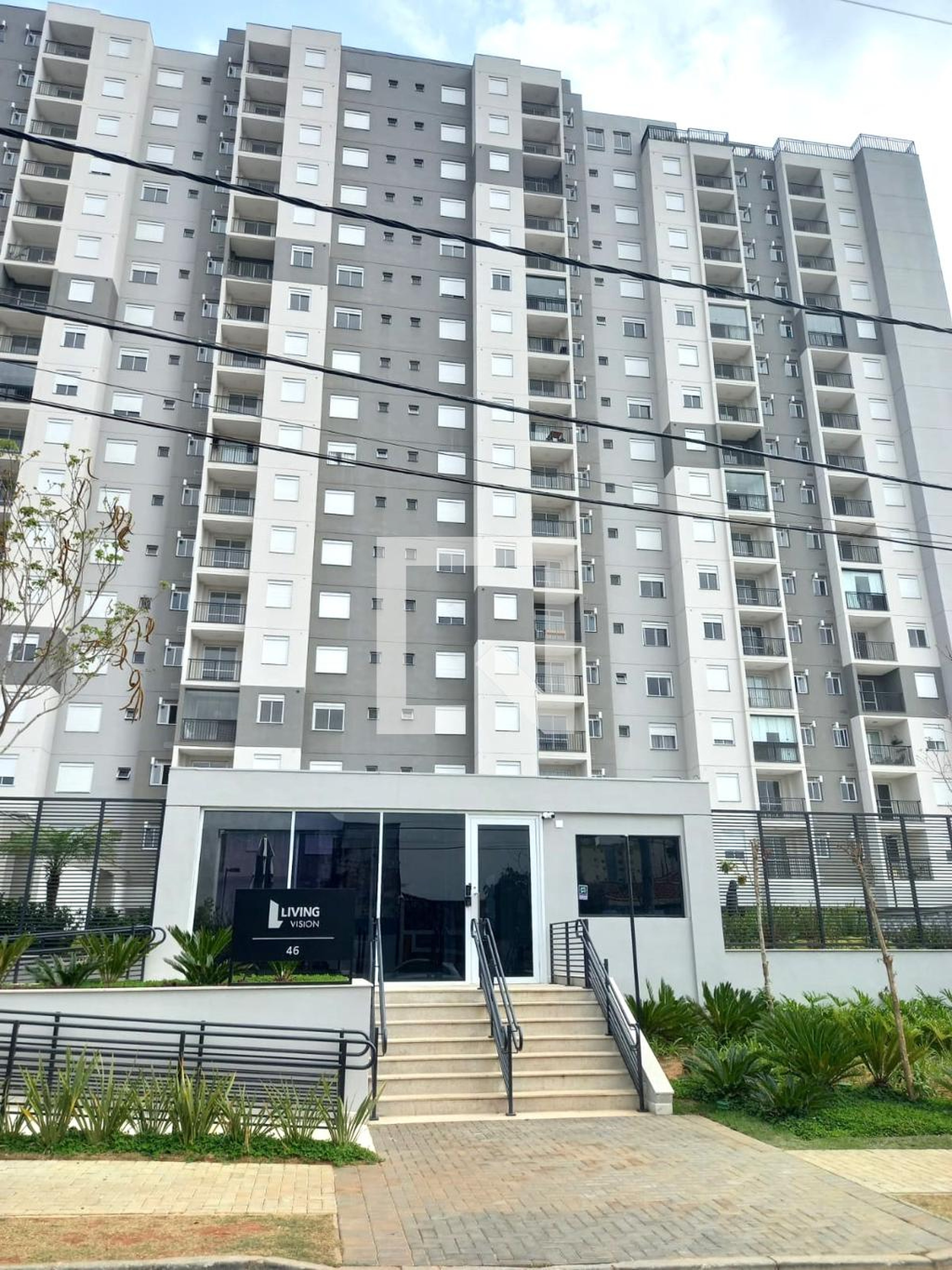 Fachada do Condomínio Condomínio Living Vision