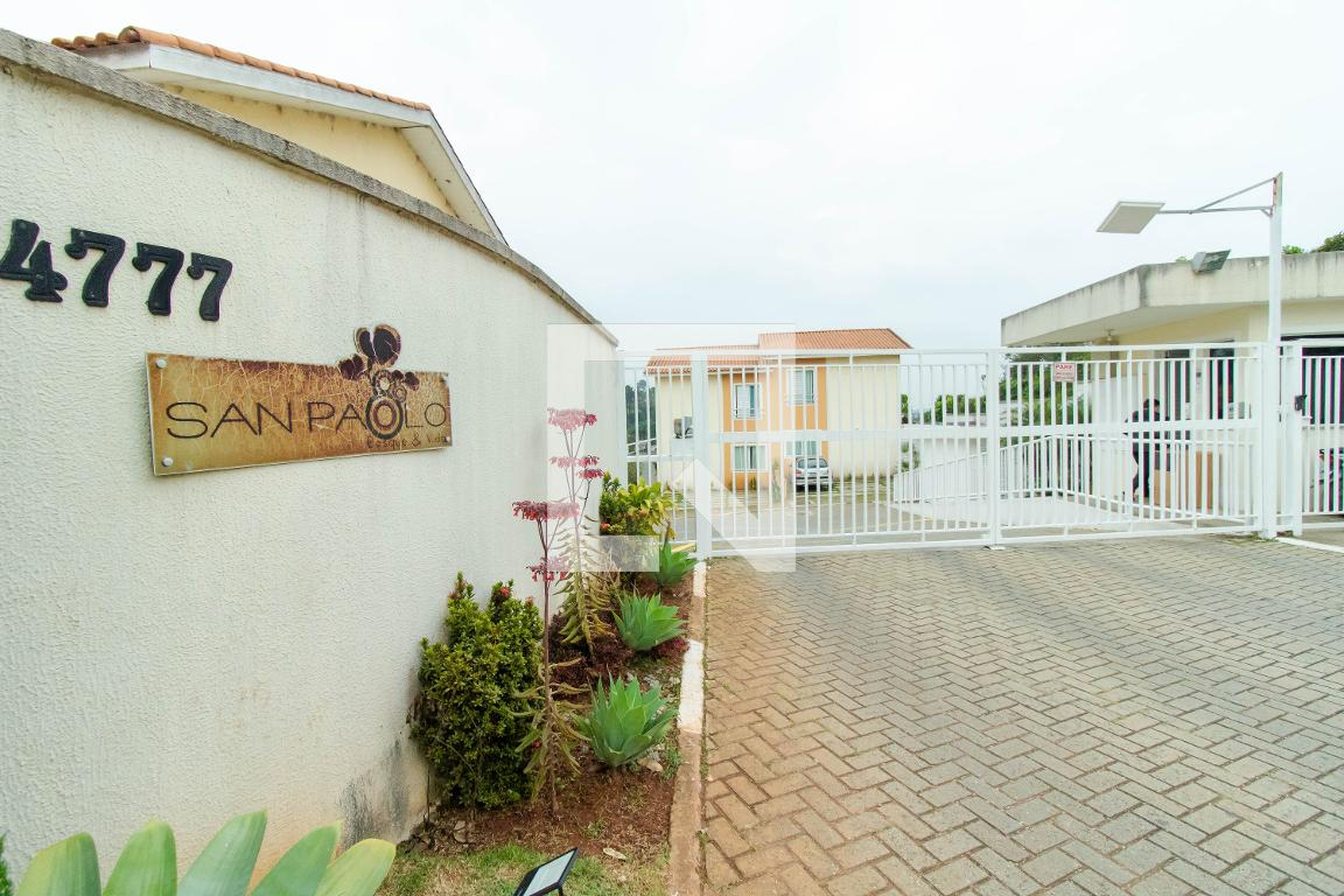 Fachada do Condomínio Condomínio San Paolo