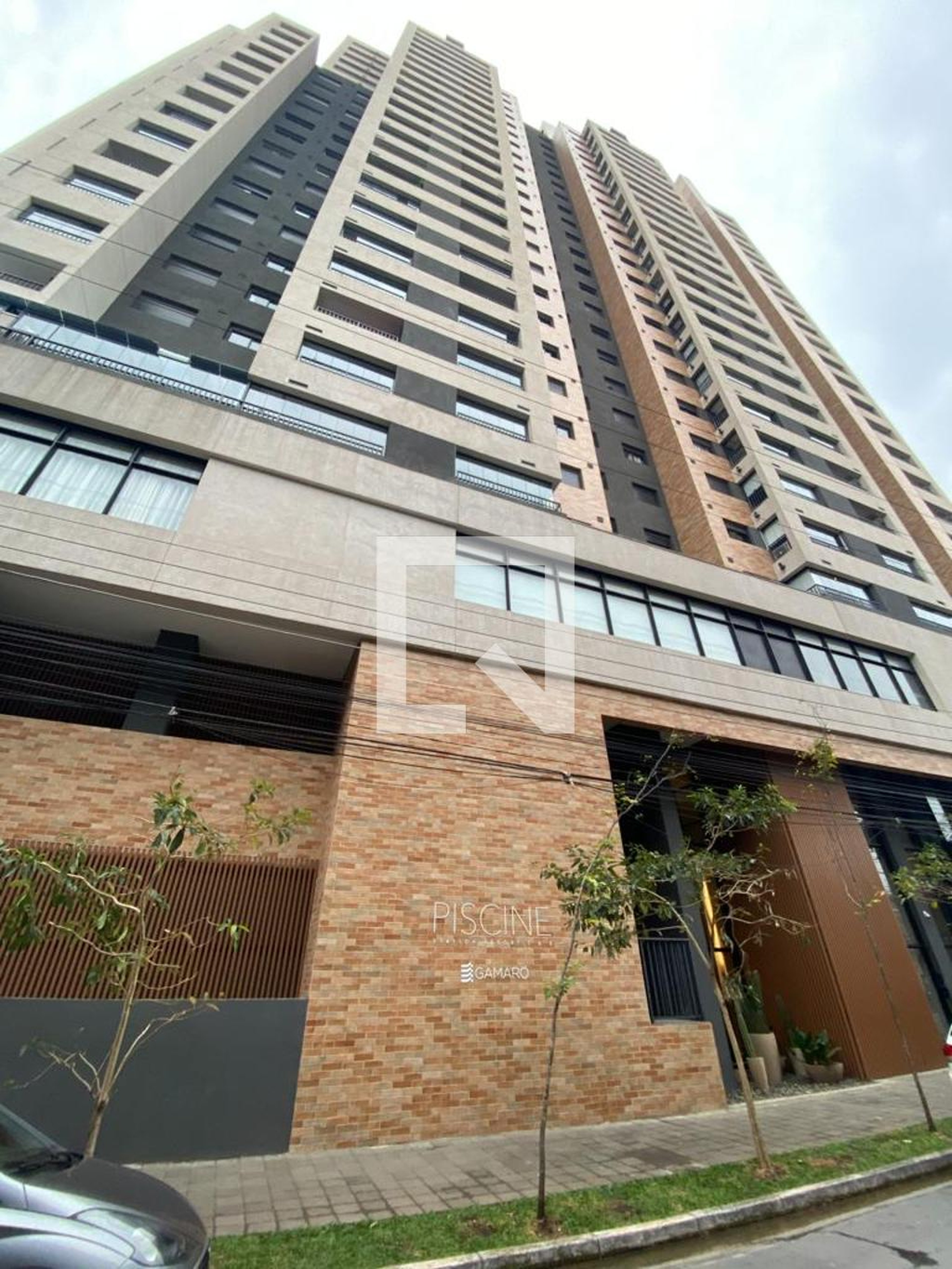 Fachada do Condomínio Condomínio Piscine Station Resort Brás