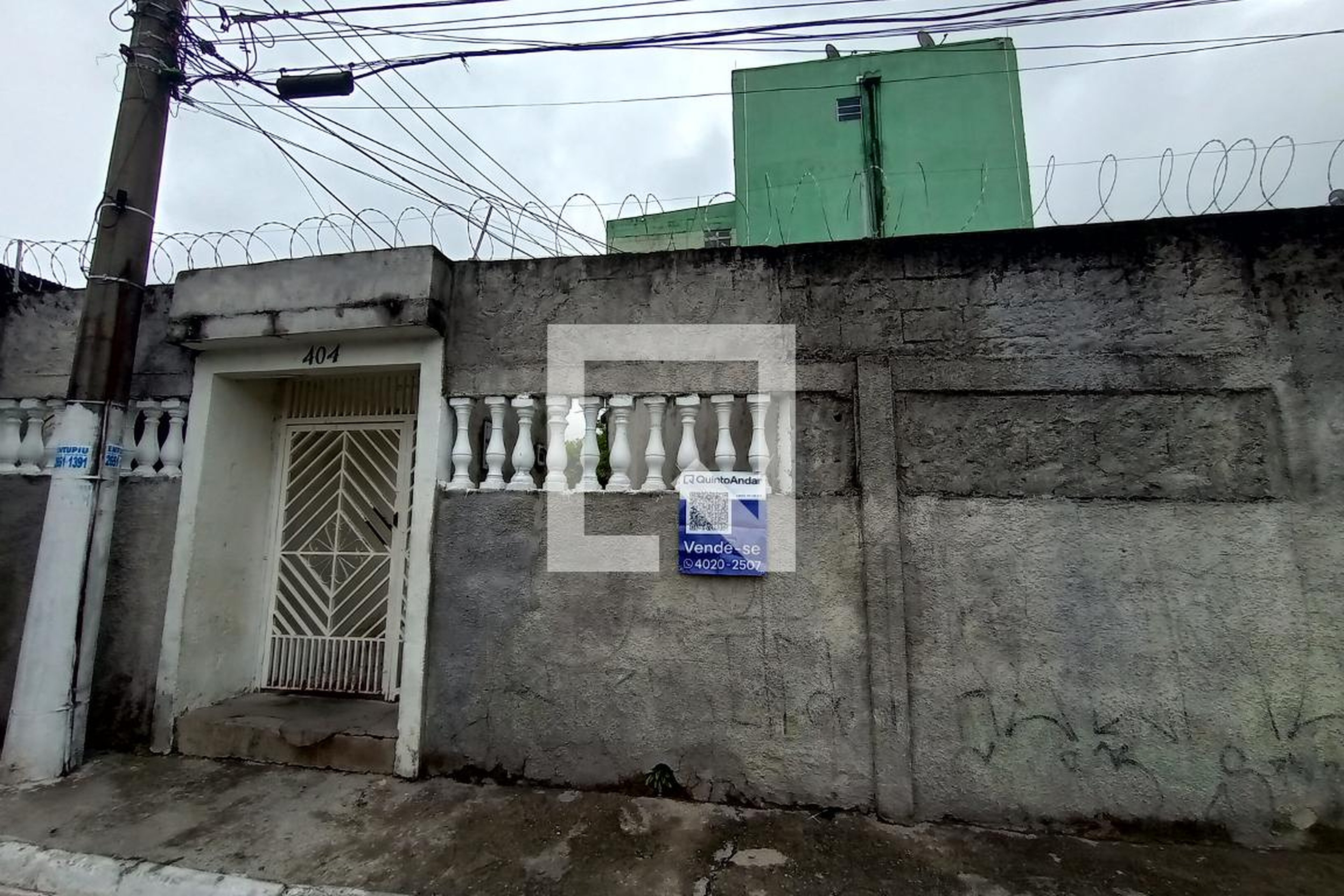 Fachada Condomínio em Rua Domênico Melli, 404