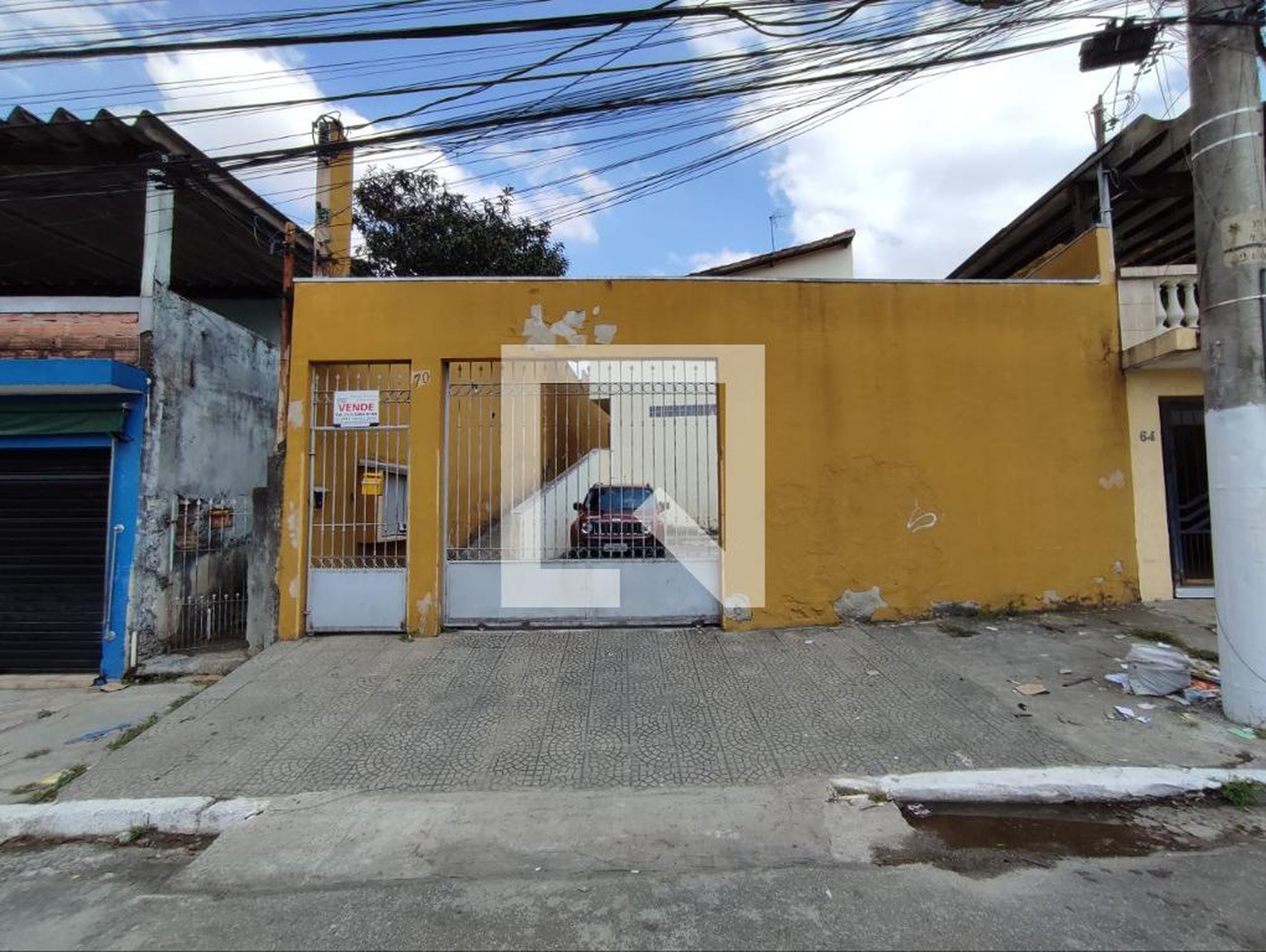 Fachada Condomínio em Rua Guilherme de Oliveira Sá, 70