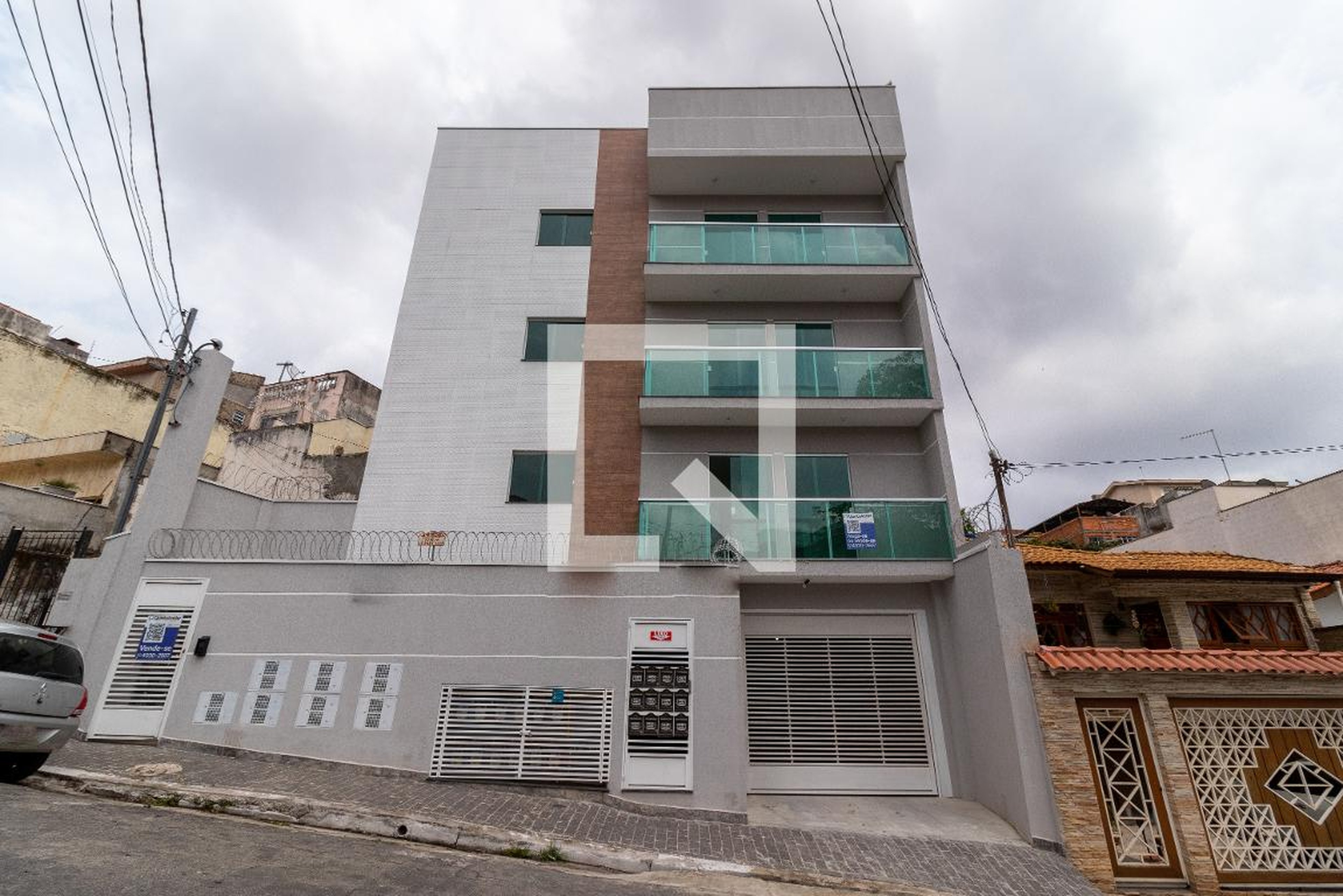 Fachada do Condomínio Condomínio Verona