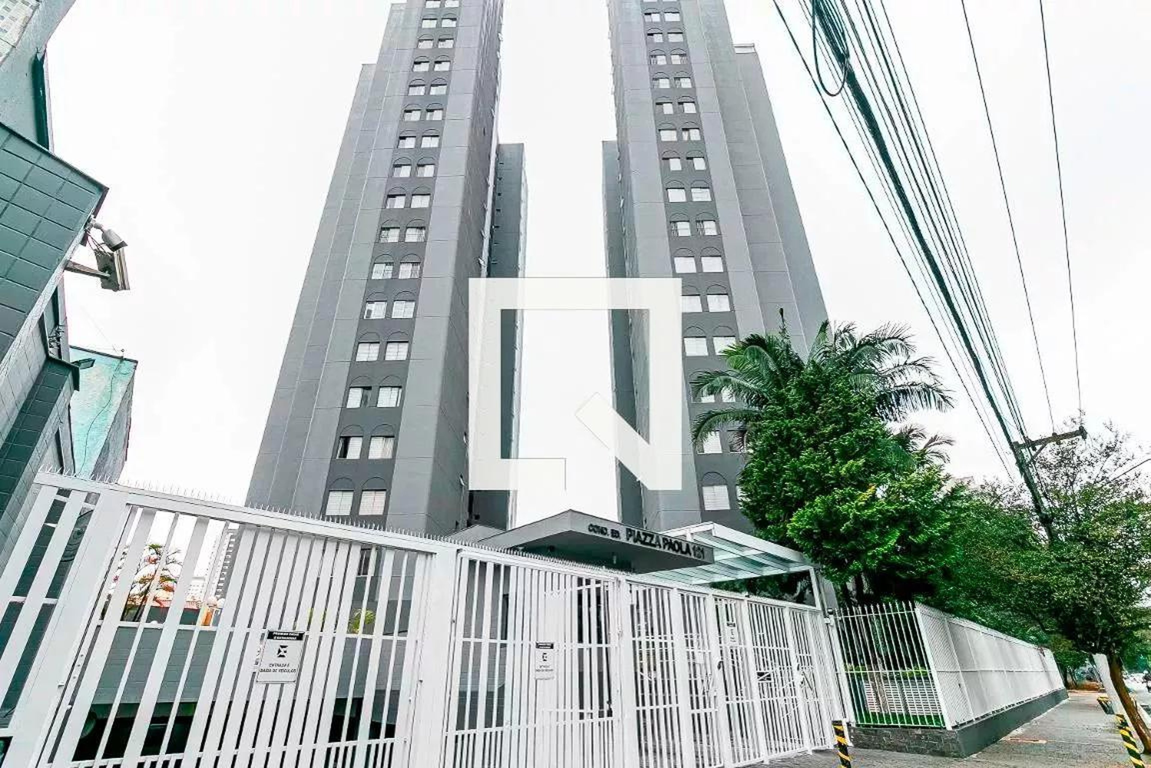 Fachada Condomínio em Rua Melo Peixoto, 1