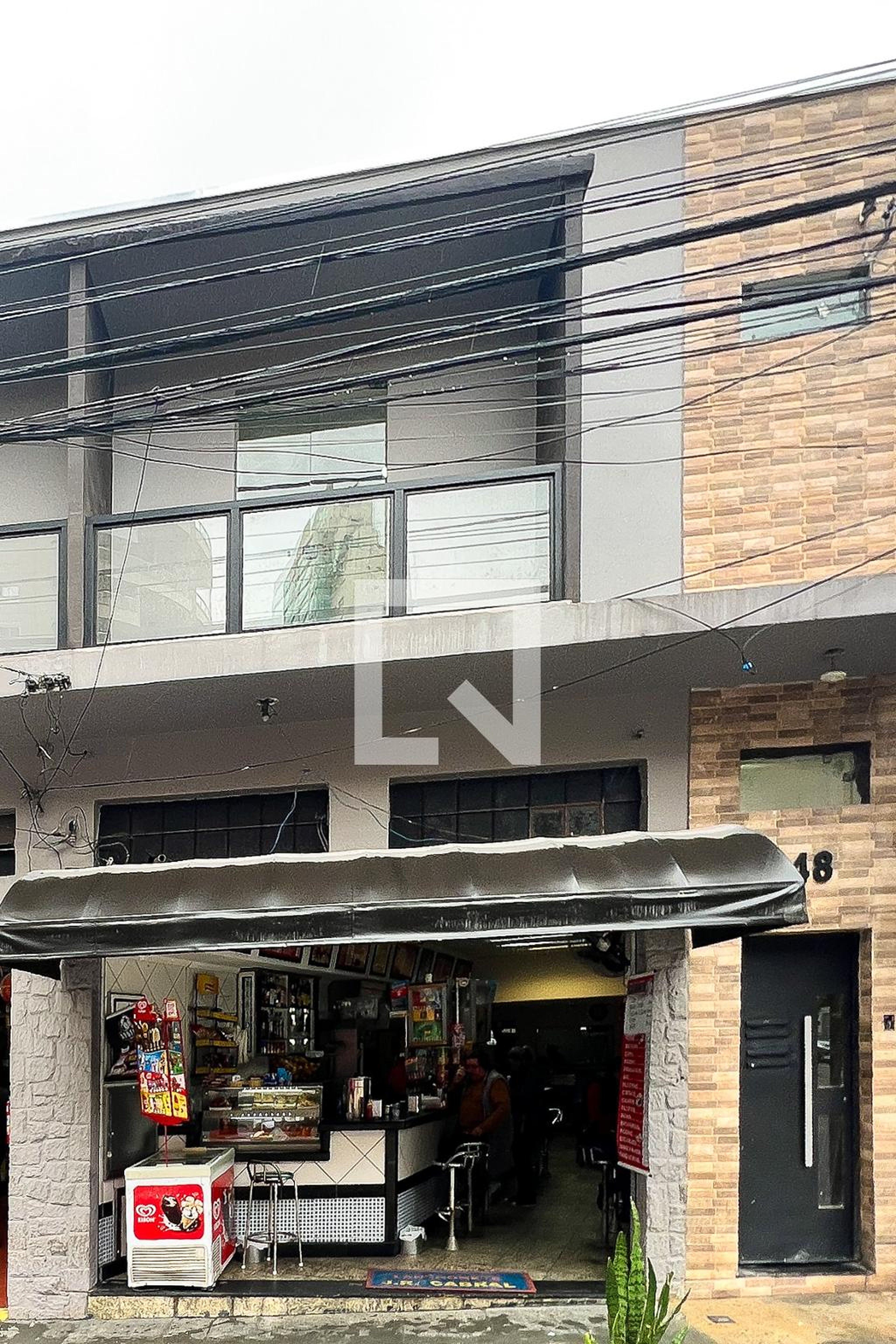 Fachada Condomínio em Rua Afonso Braz, 348