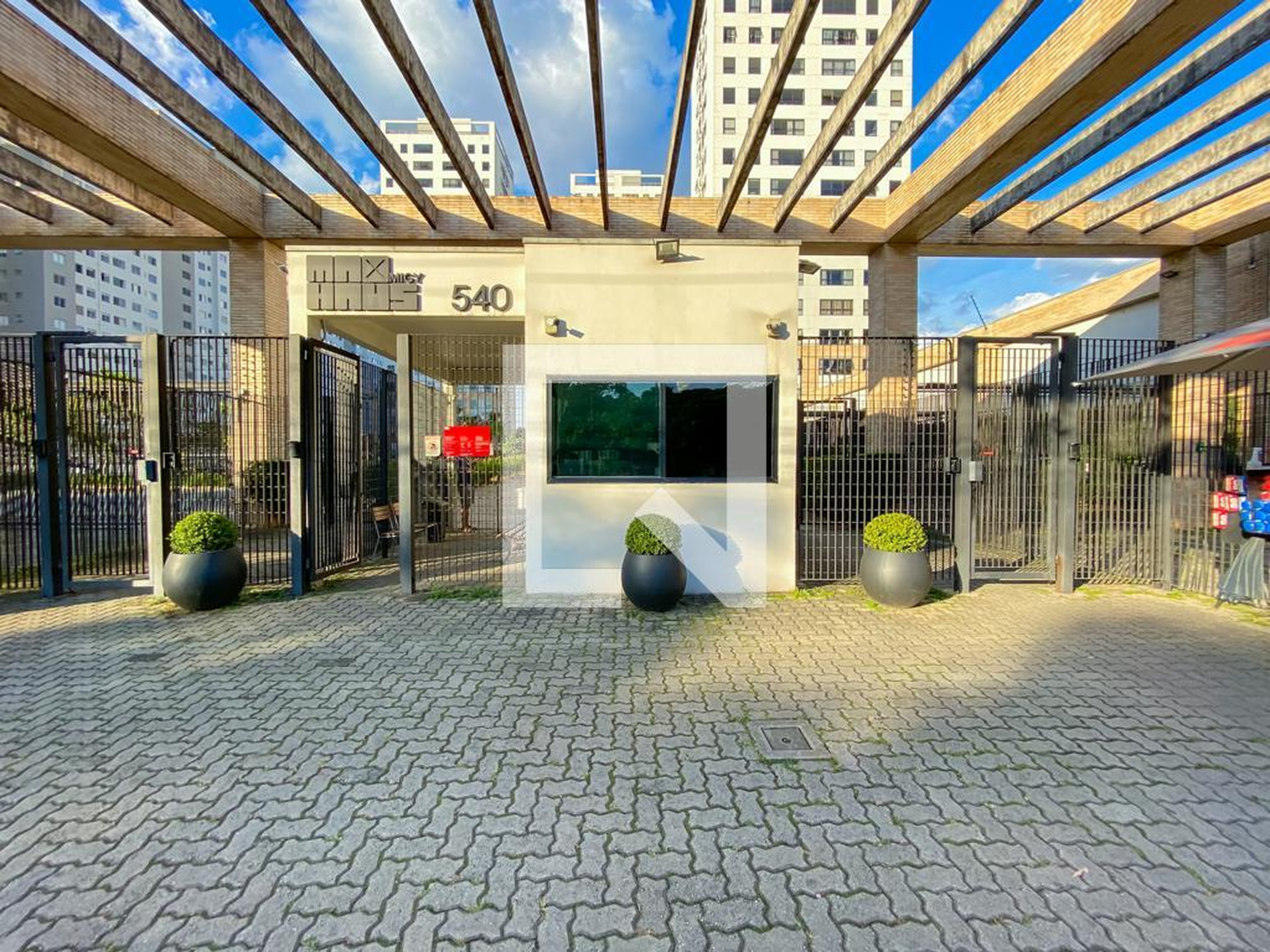 Fachada do Condomínio Condomínio Max Haus