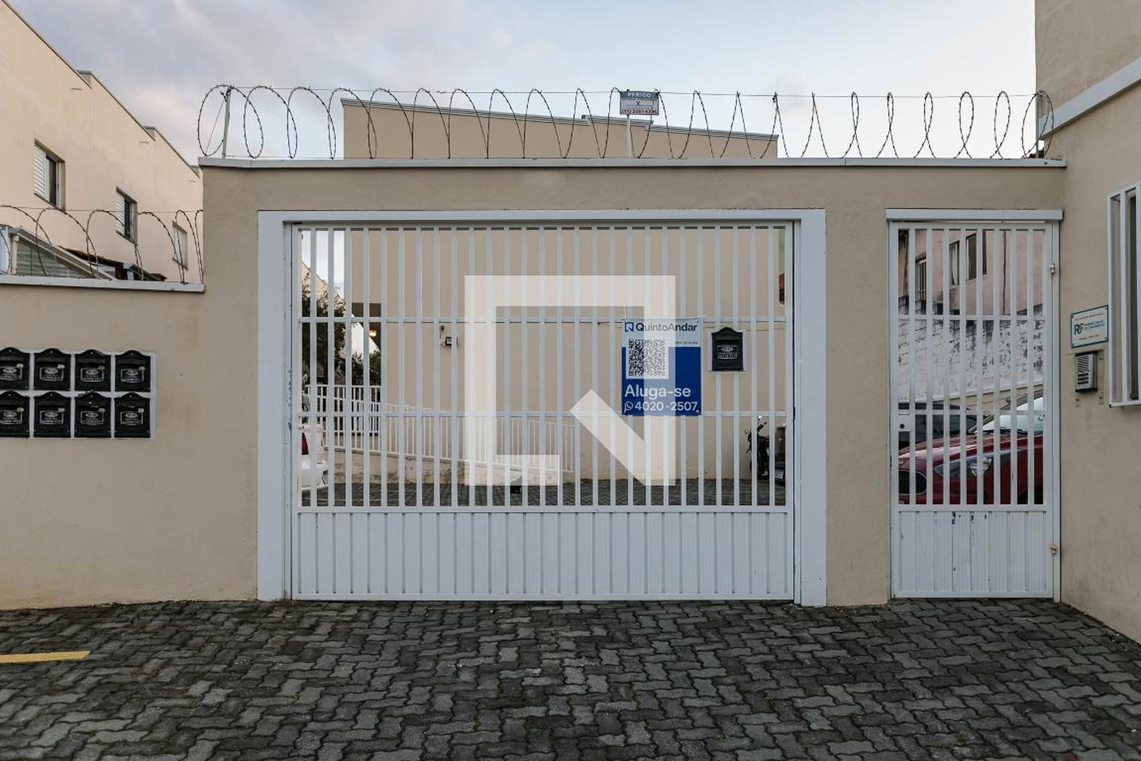 Fachada Condomínio em Rua Maria Gomes dos Santos, 20